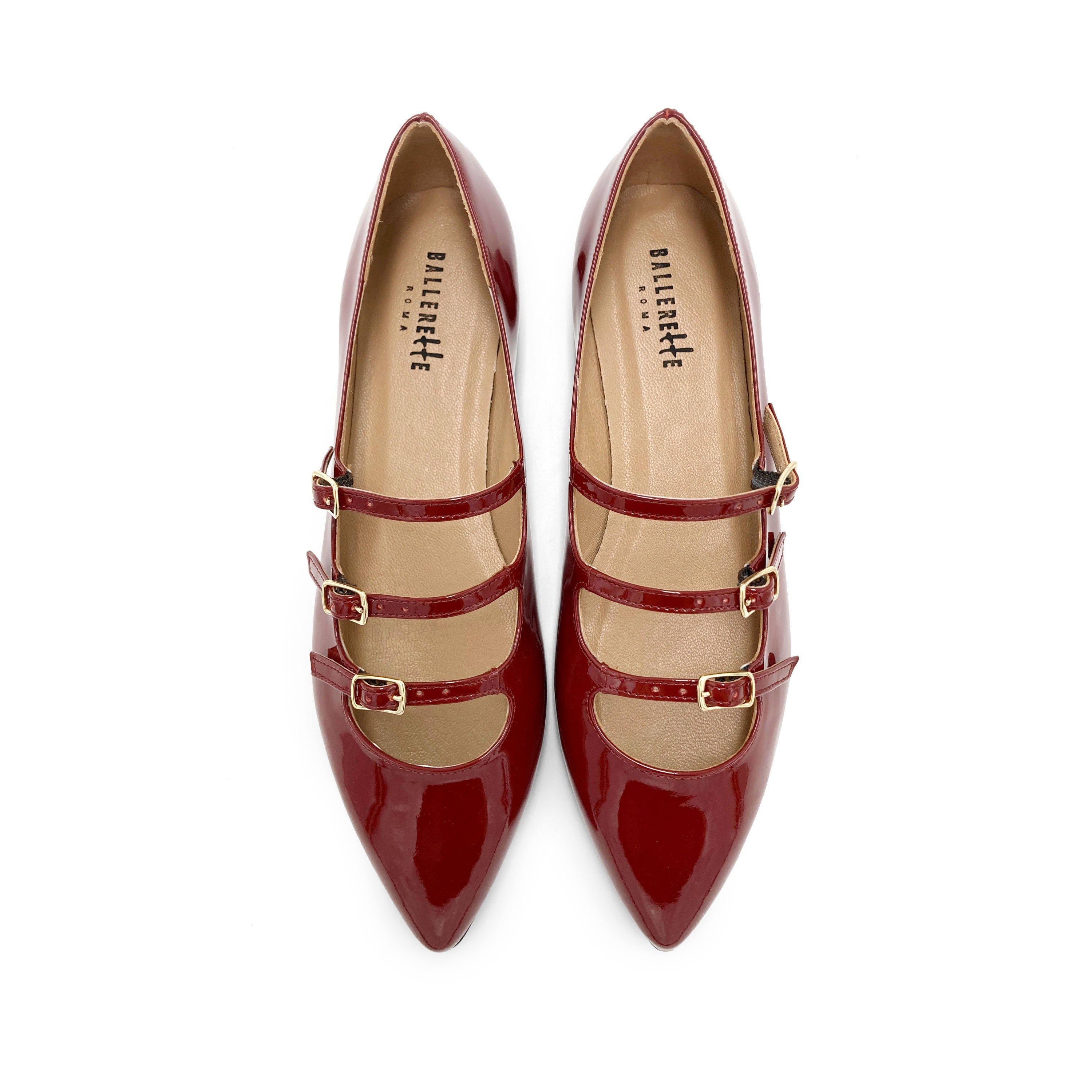 Red shiny pointed ballet flats with three straps