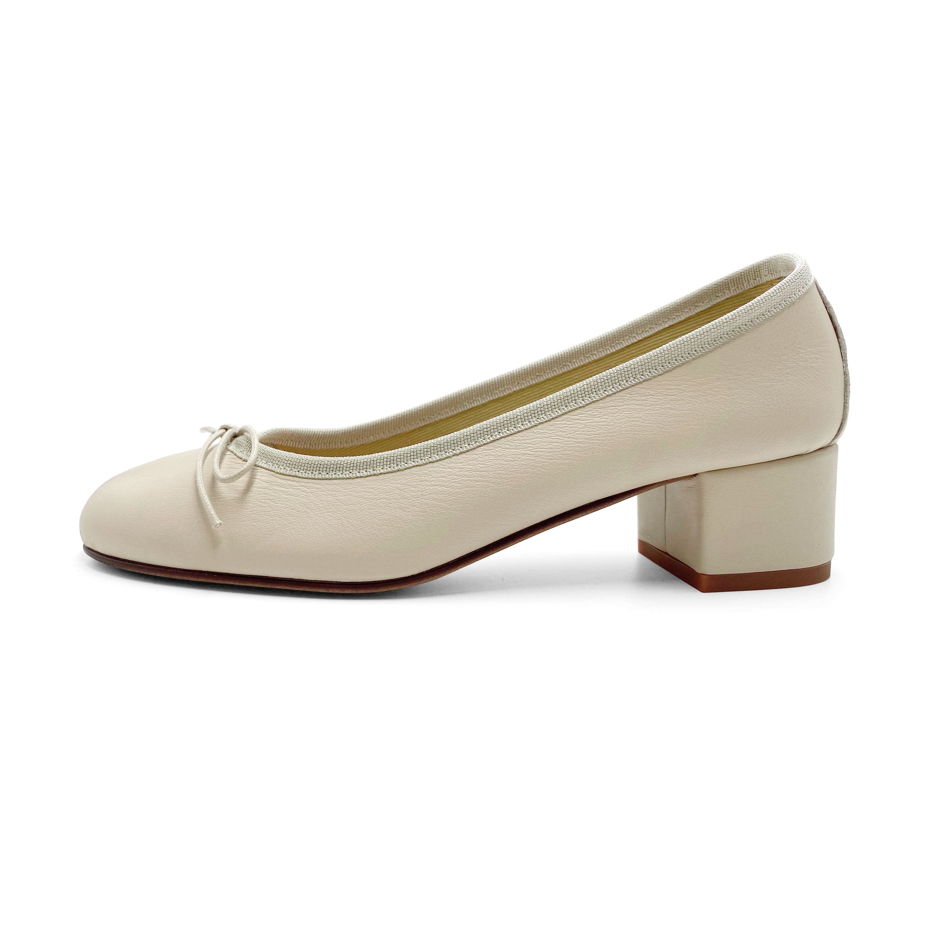 Beige leather ballet flats with heel
