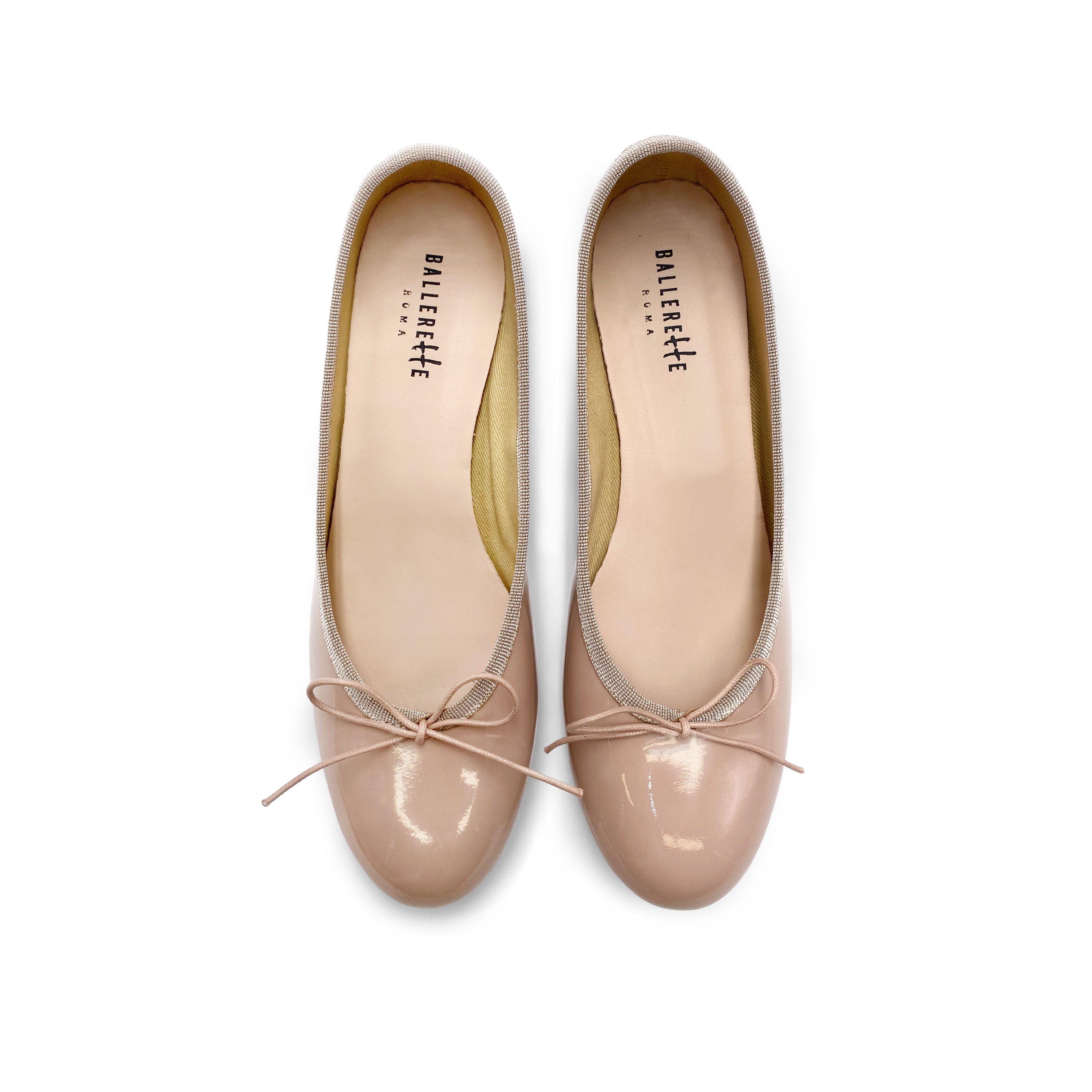 Powder pink patent leather ballet flats with heel