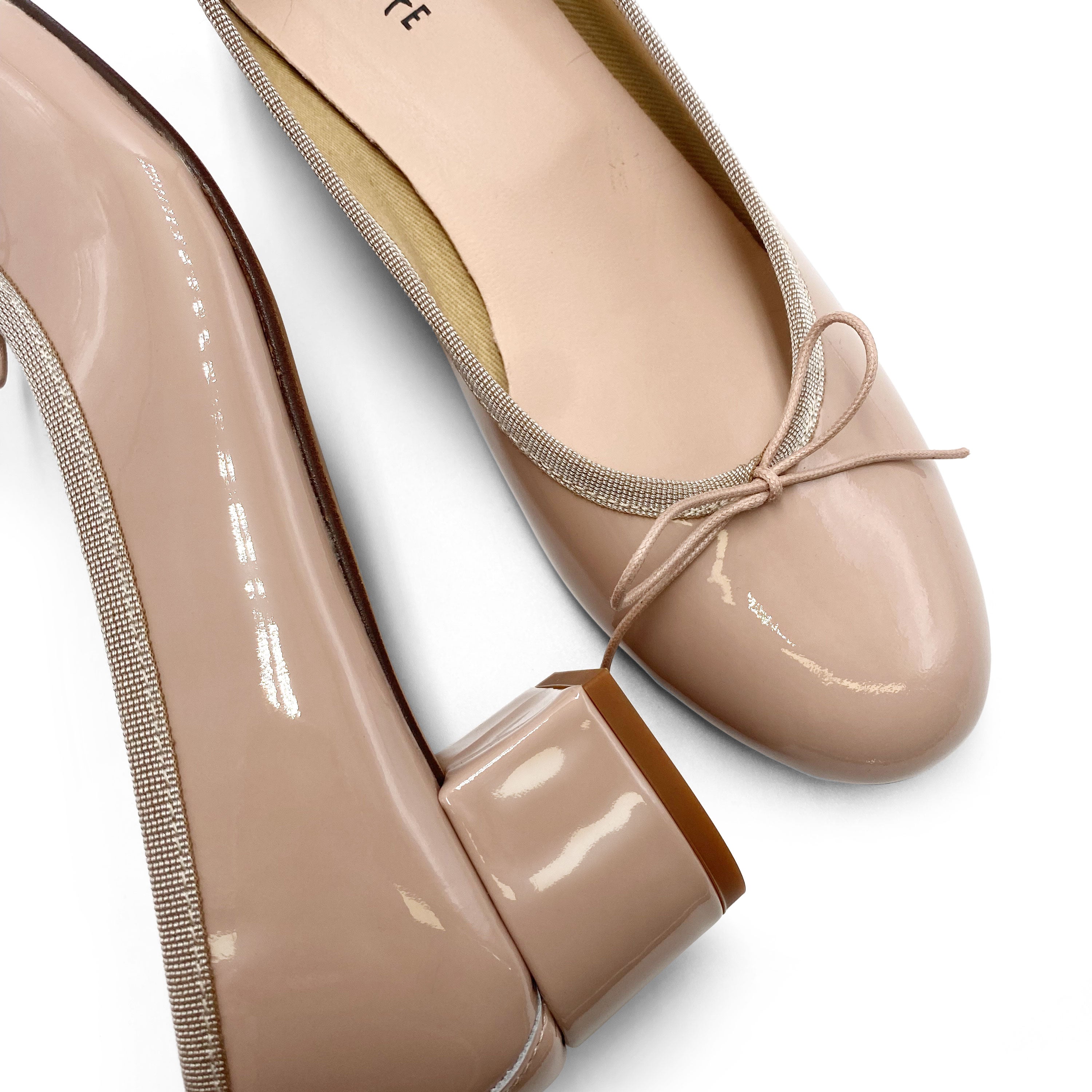 Powder pink patent leather ballet flats with heel