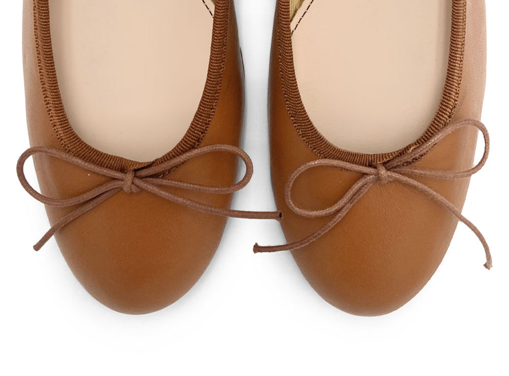 Tan leather ballet flats with heel