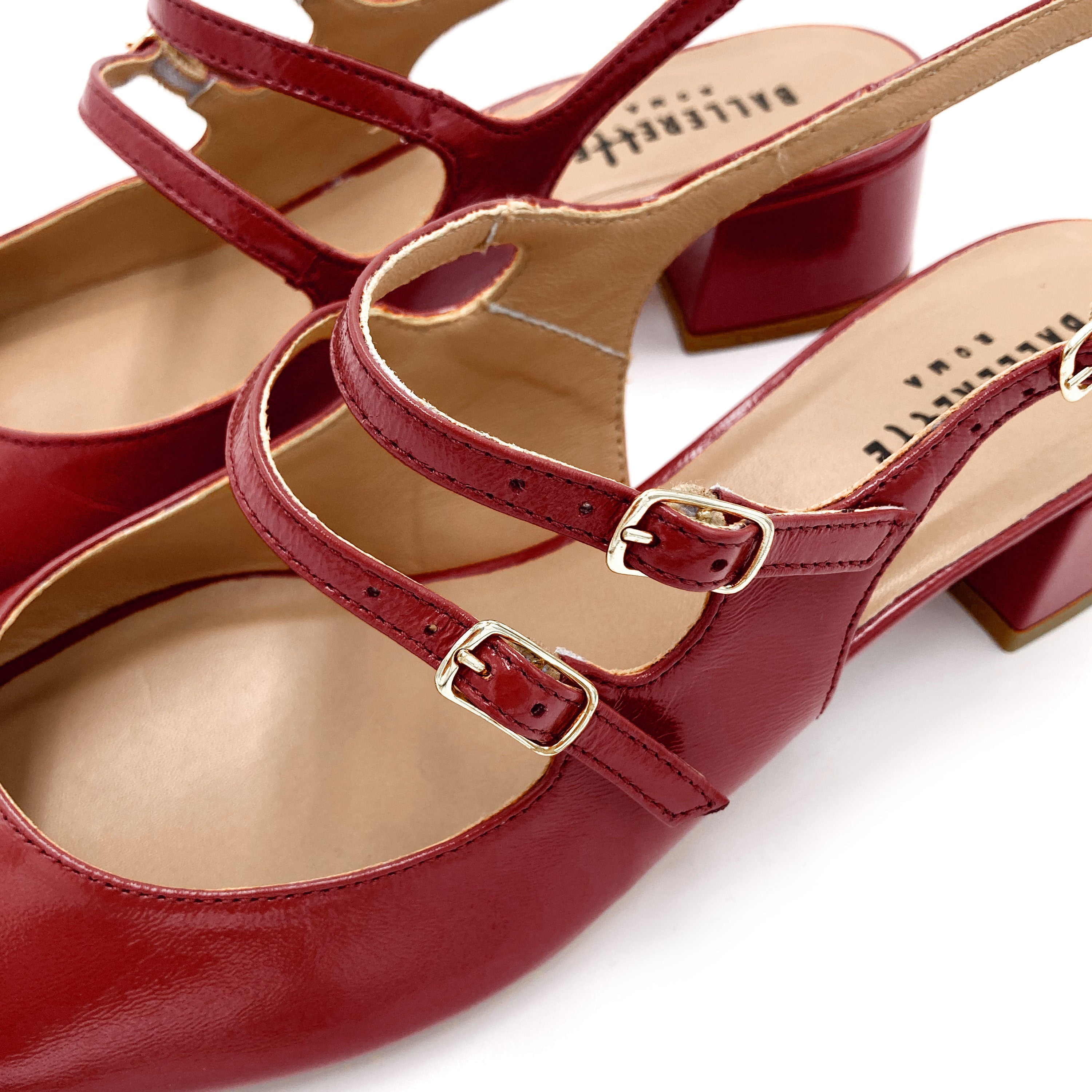 Red patent leather slingback ballet flats with heel