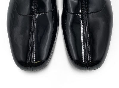 Black patent leather ankle boots with elasticated sock