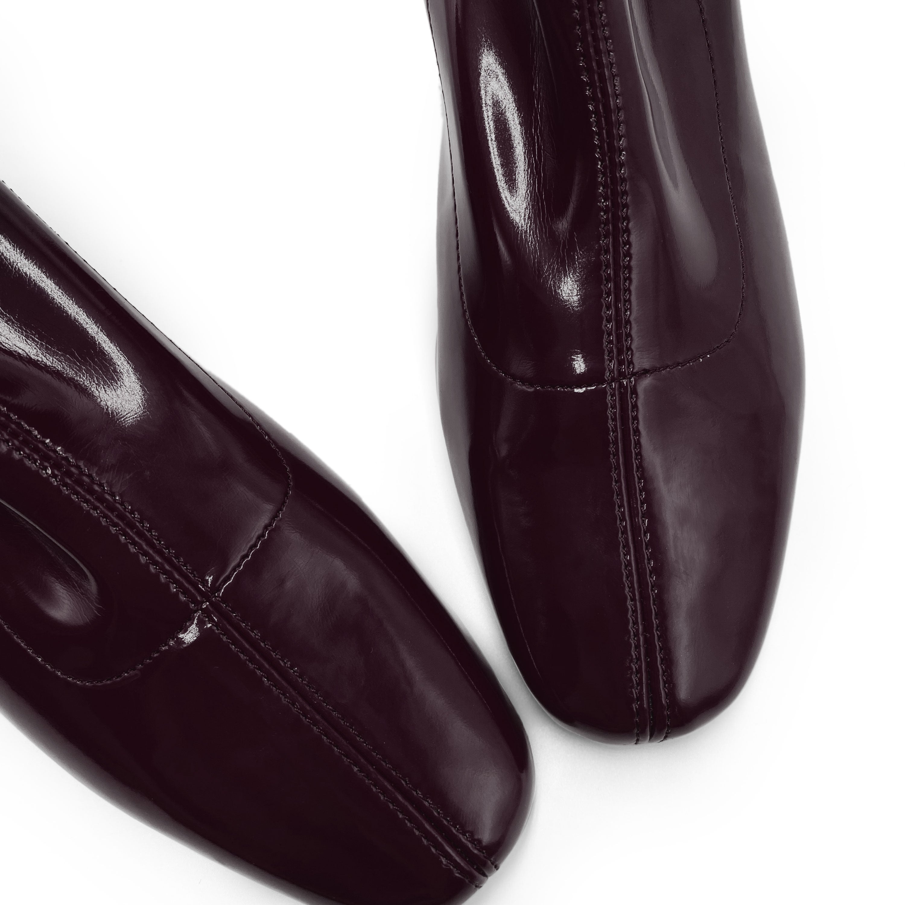 Eggplant patent ankle boots with stretch sock fit