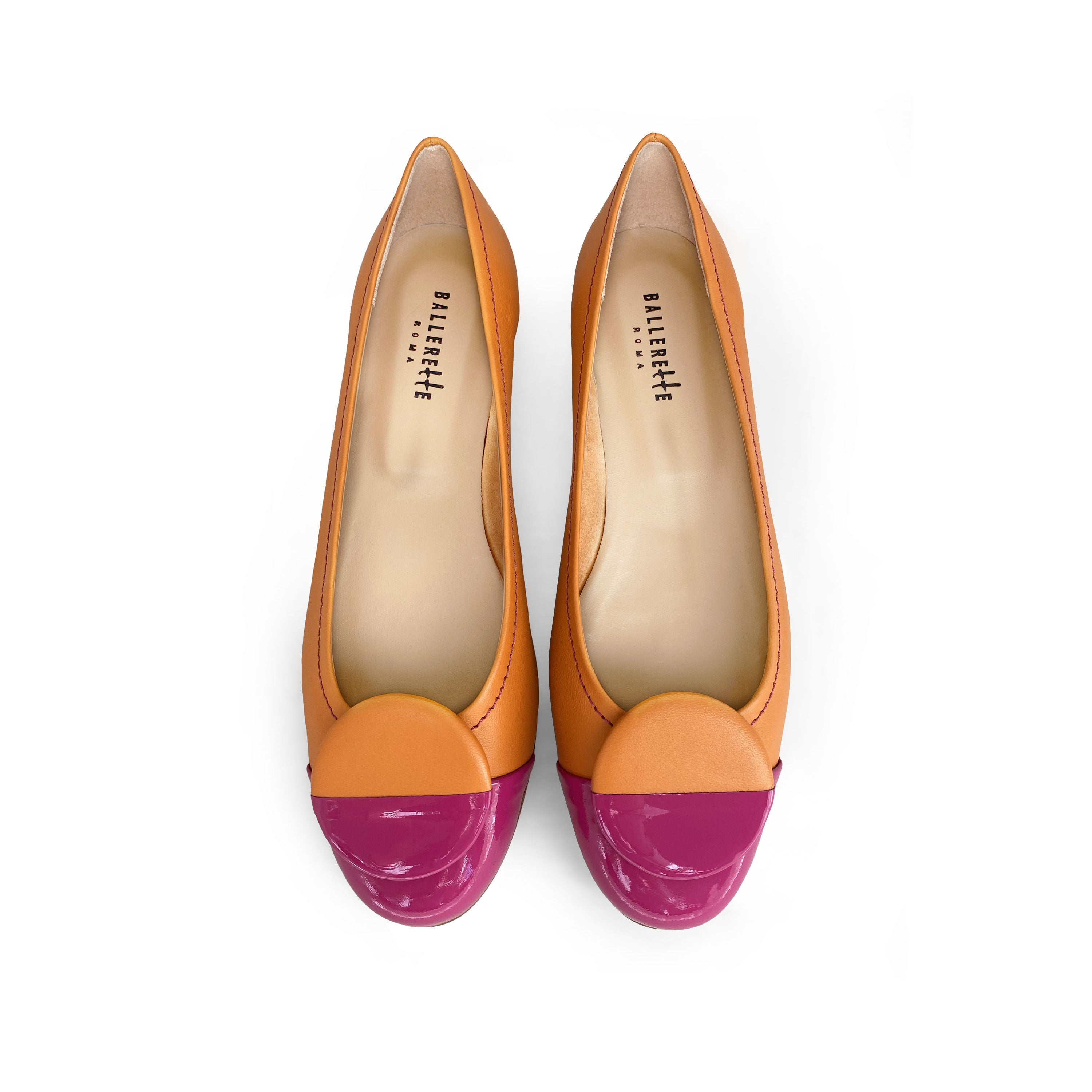 Orange leather ballet flats with fuchsia patent leather toe and stud