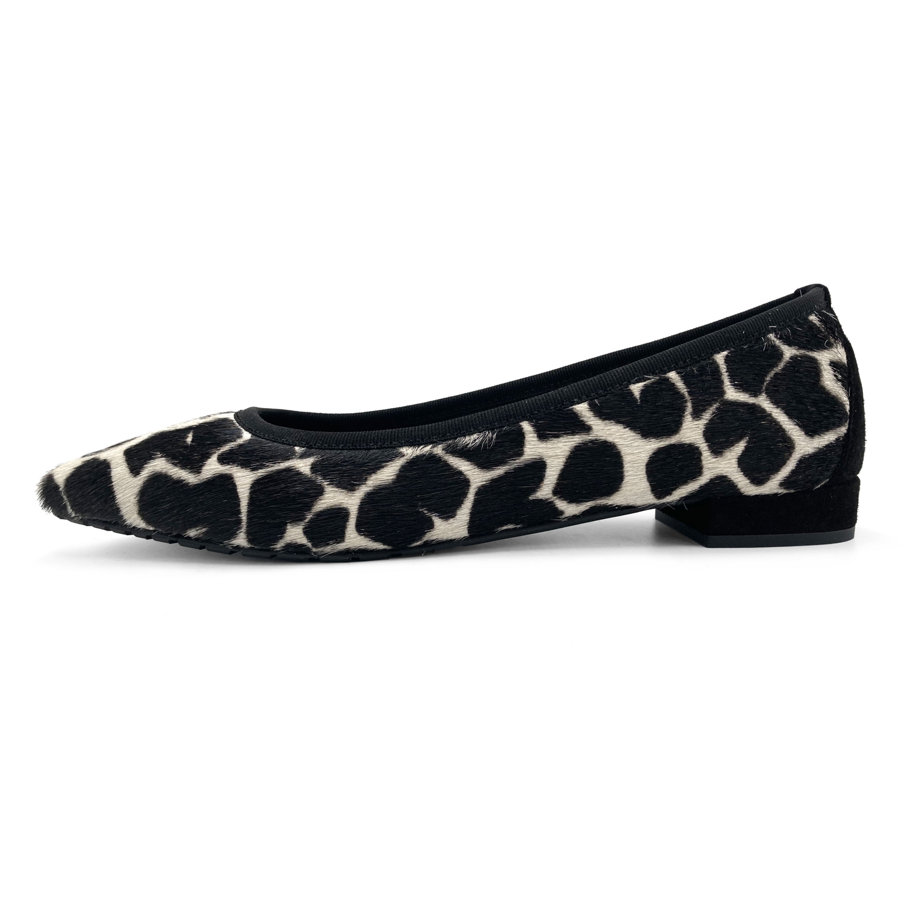 Black and white animal print pointed ballet flats