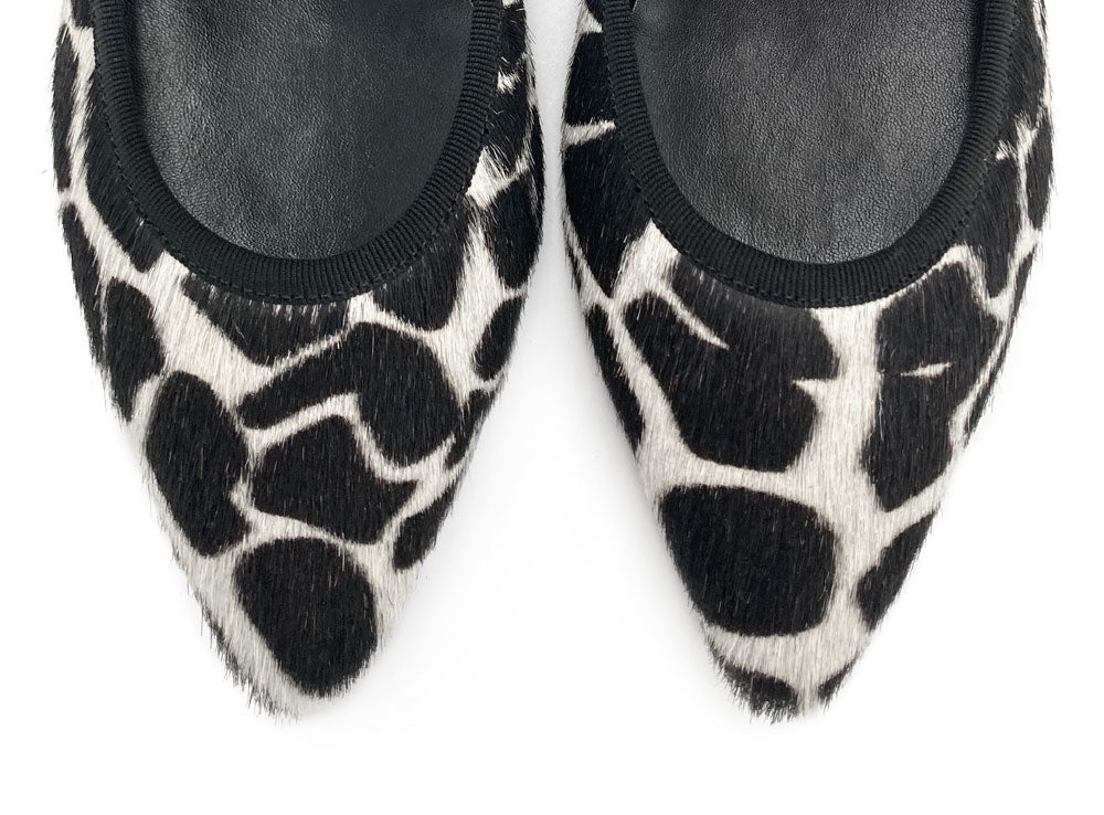 Black and white animal print pointed ballet flats