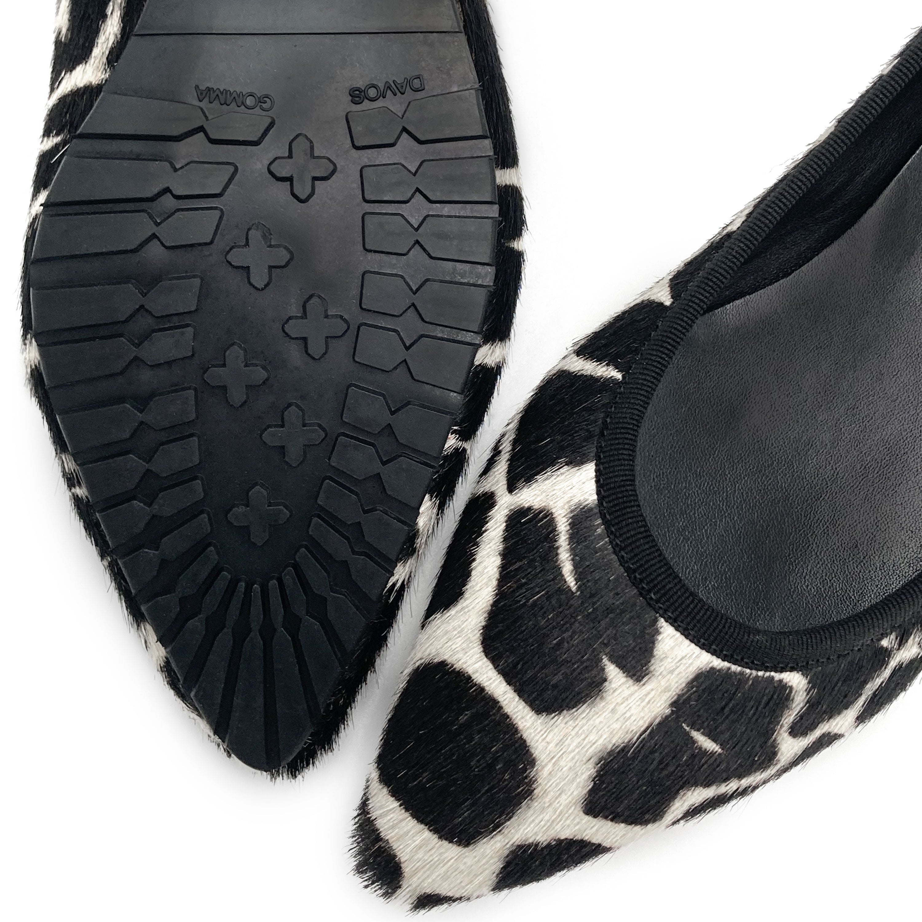 Black and white animal print pointed ballet flats