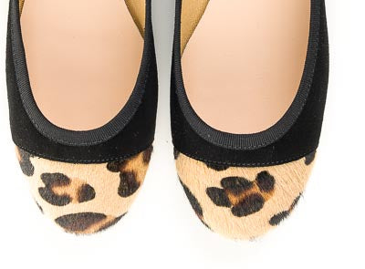 Black suede ballet flats with leopard spotted toe