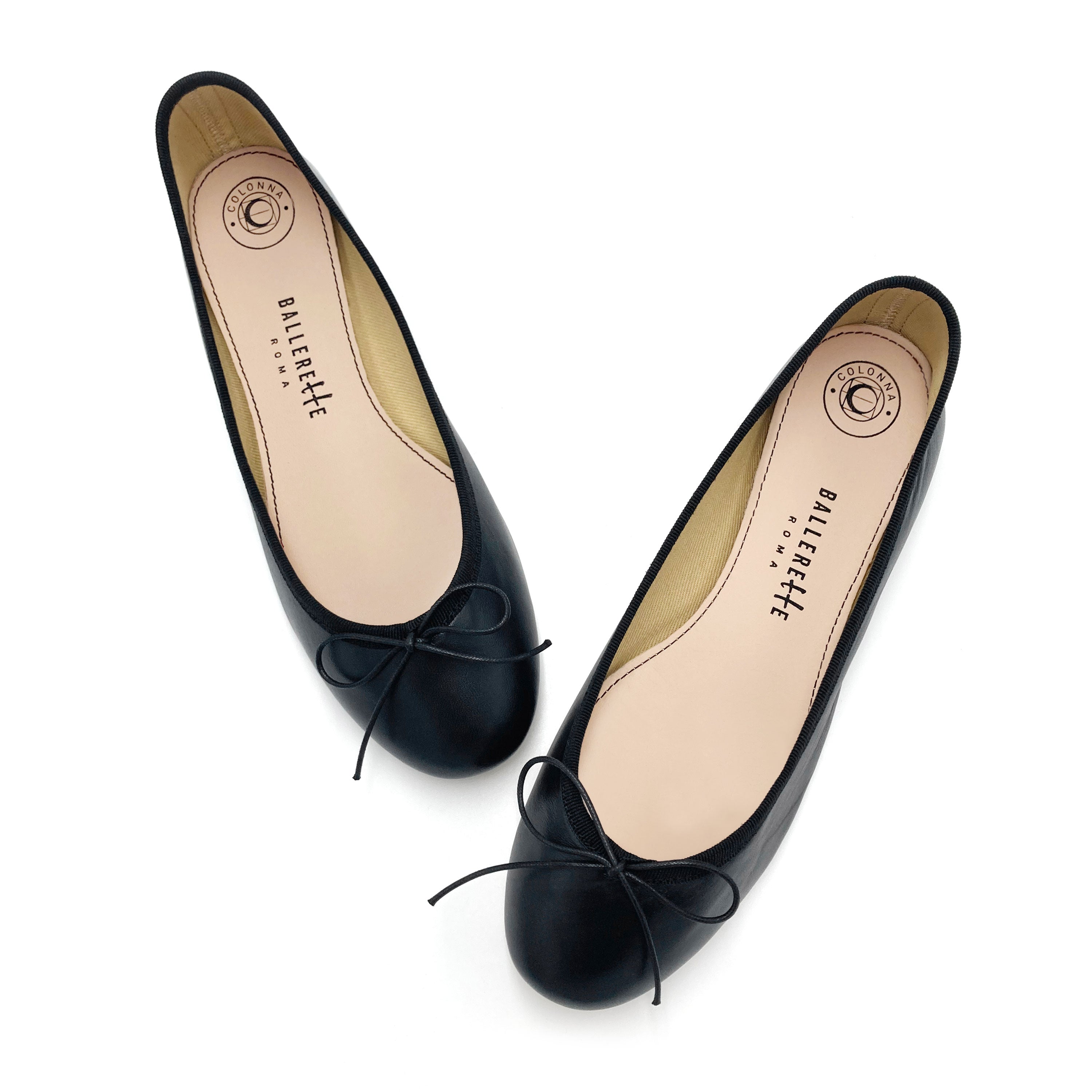 Black leather ballet flats