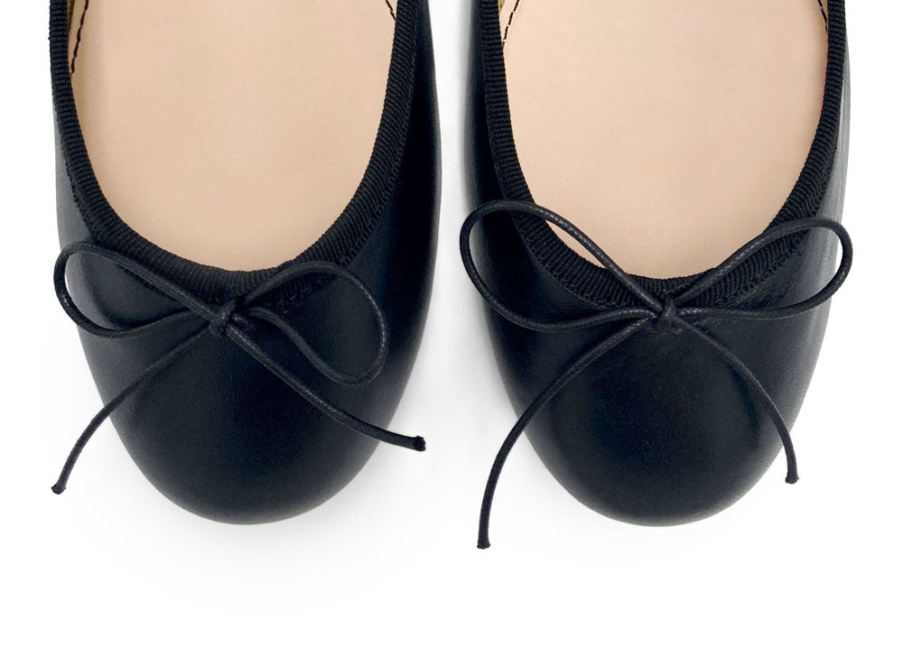 Black leather ballet flats