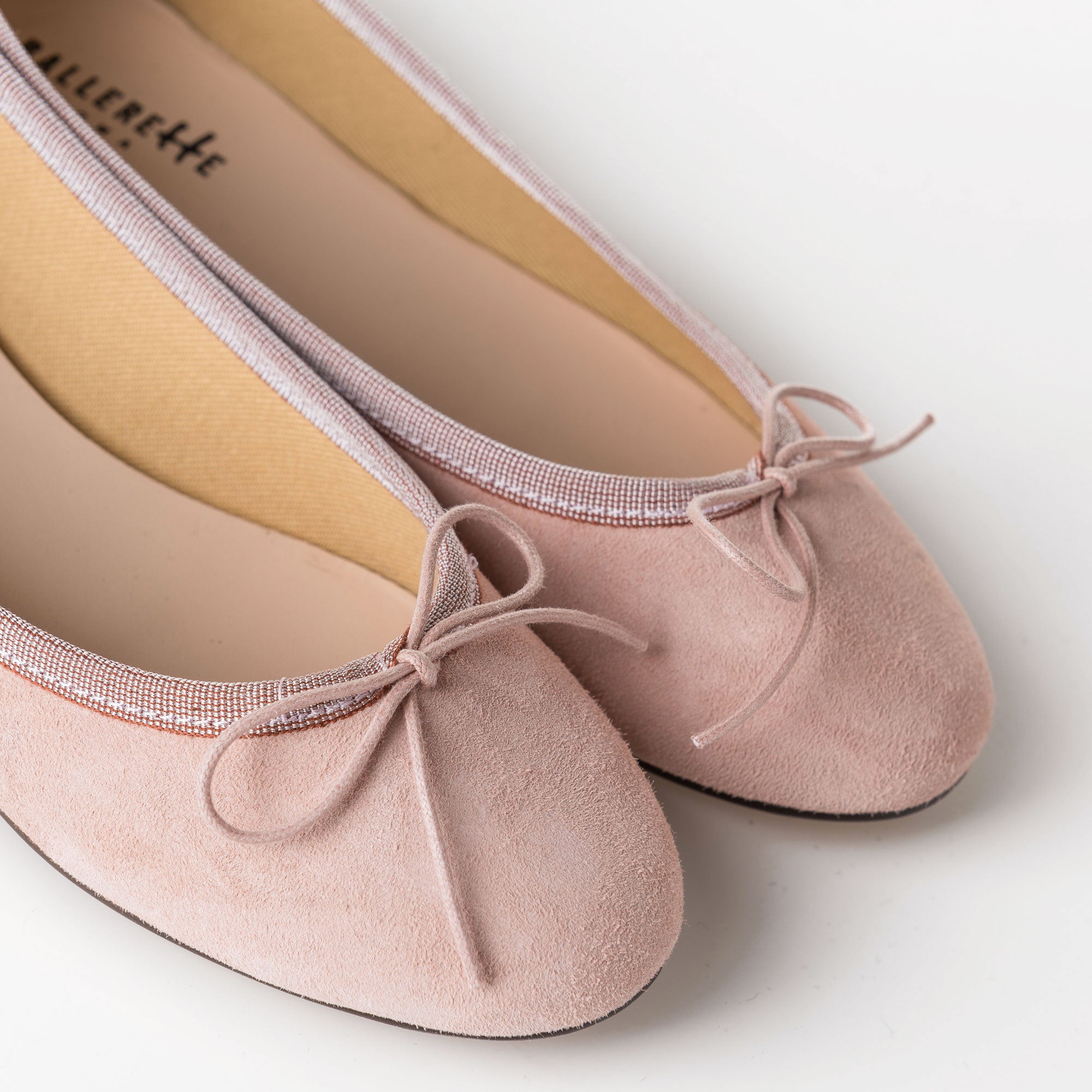 Pink suede ballet flats