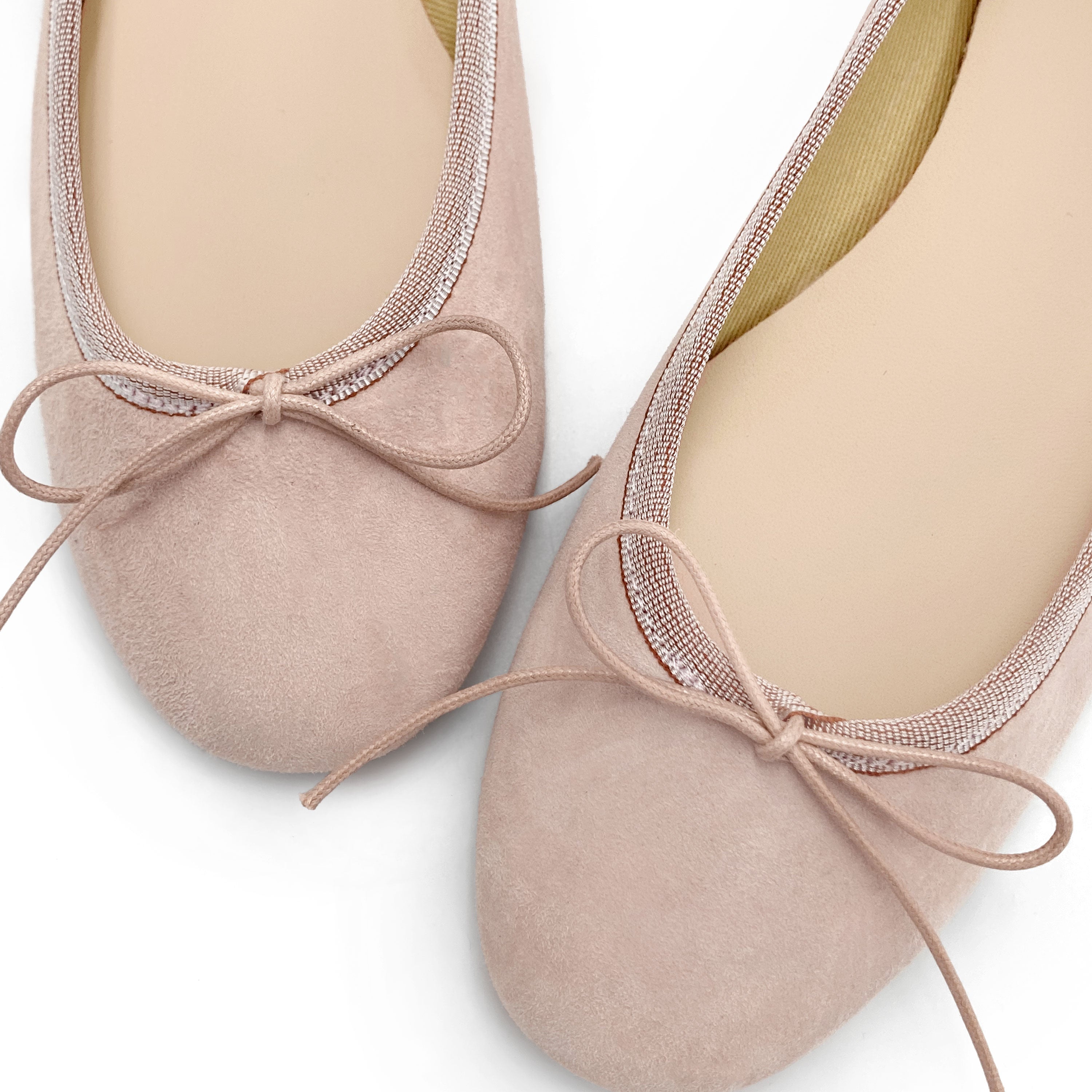Pink suede ballet flats