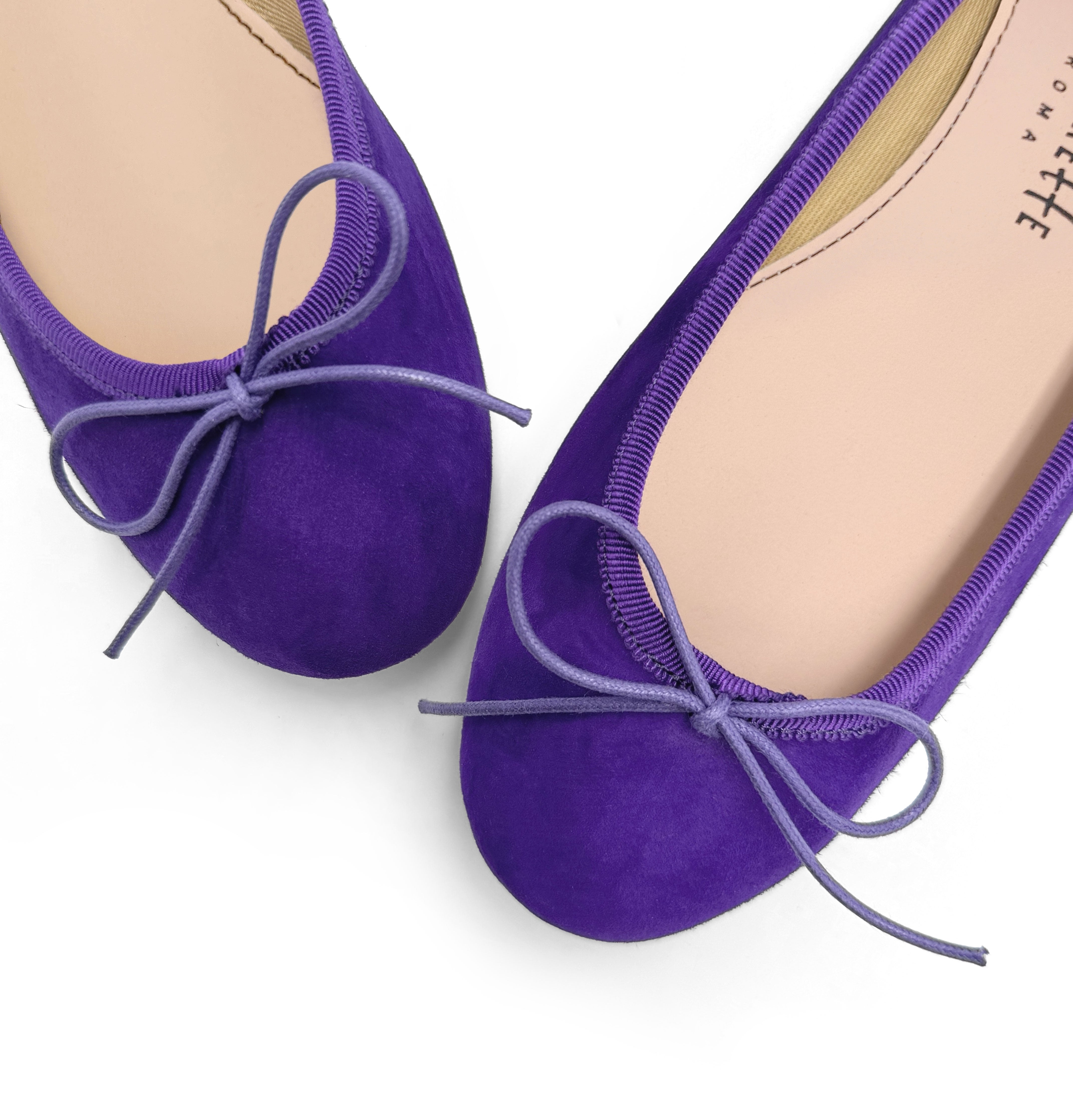 Purple suede ballet flats