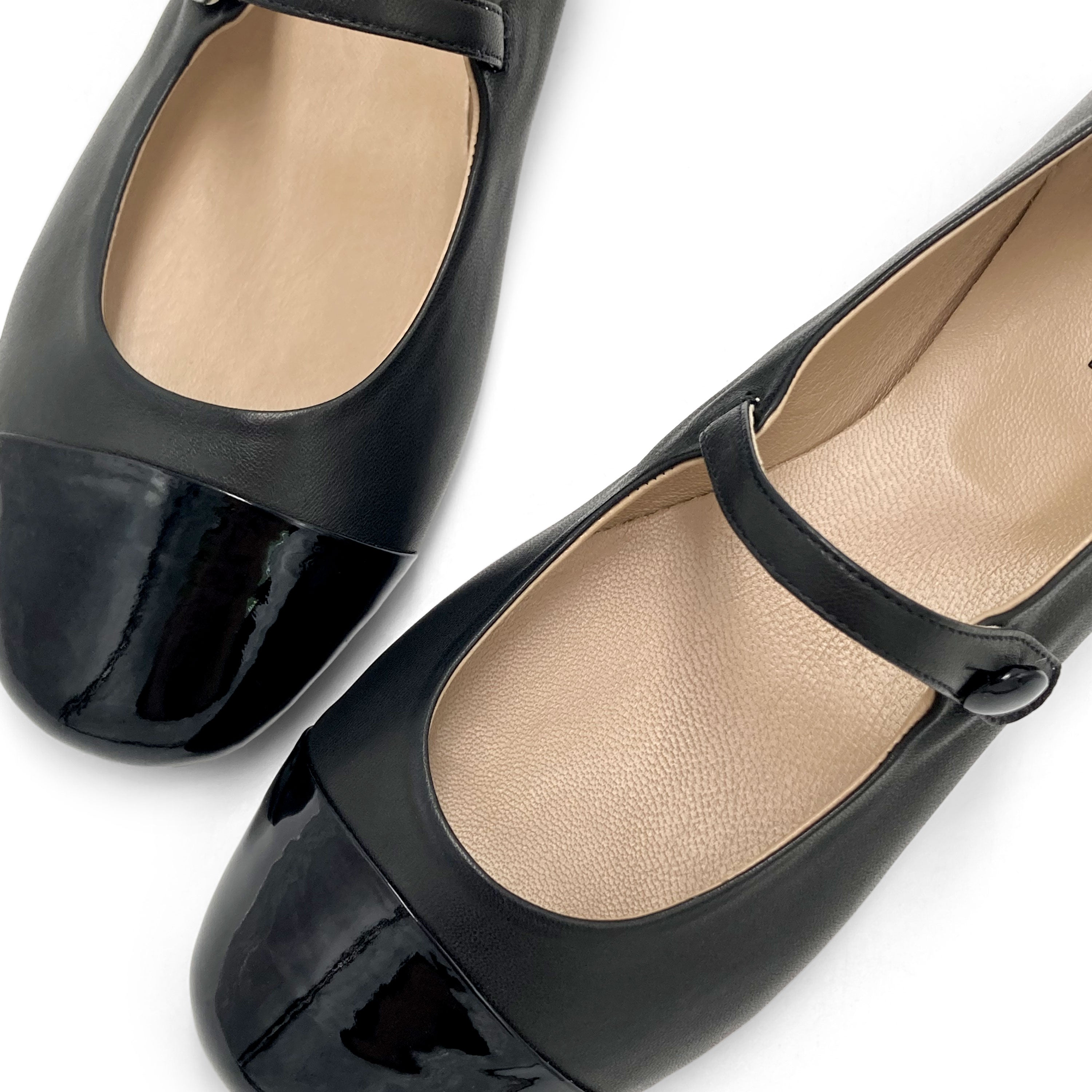Black ballet flats with black patent toe and strap