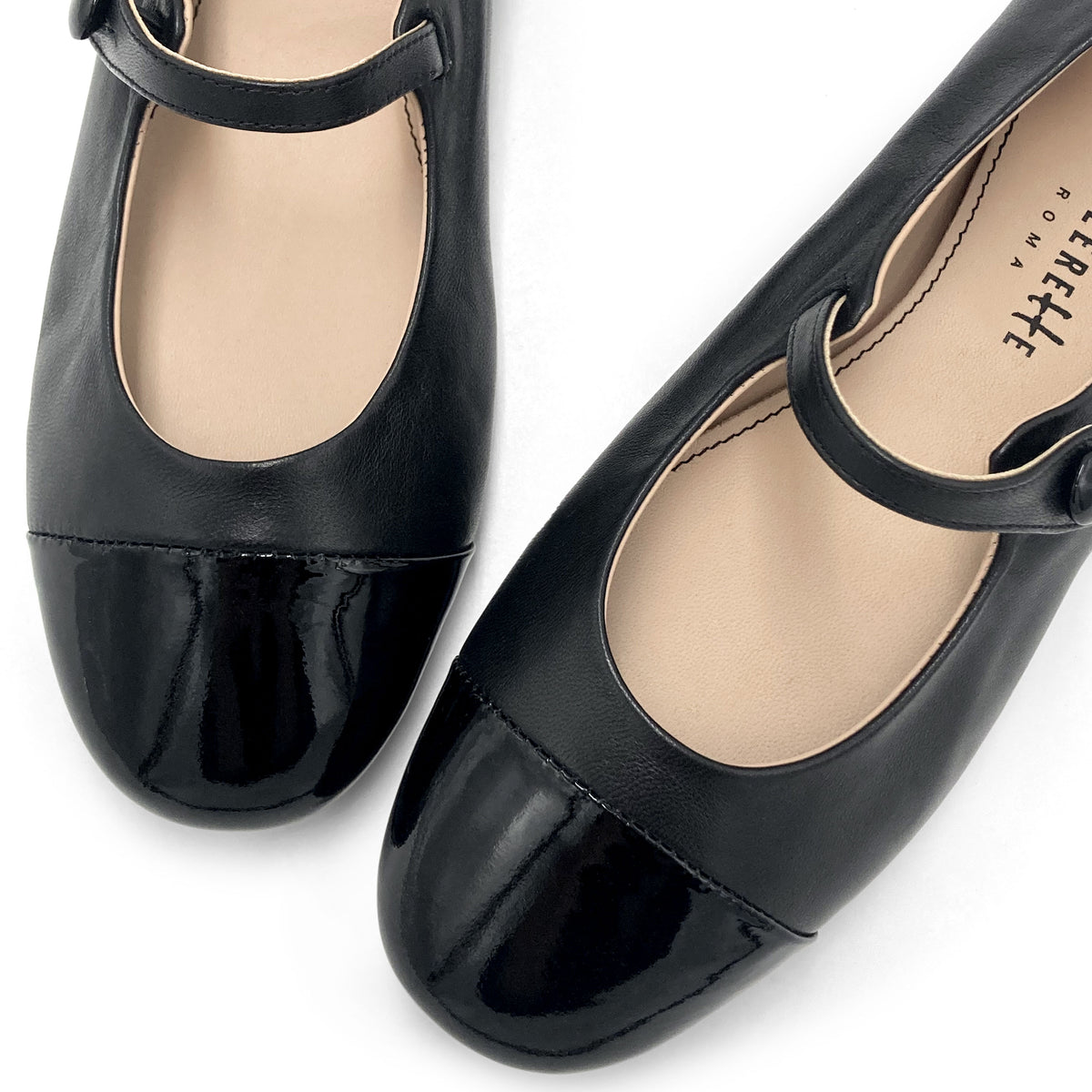 Black ballet flats with black patent toe and strap