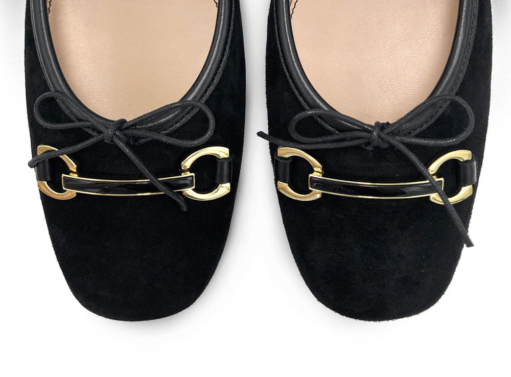 Black suede Mary Jane ballet flats with a metal clasp