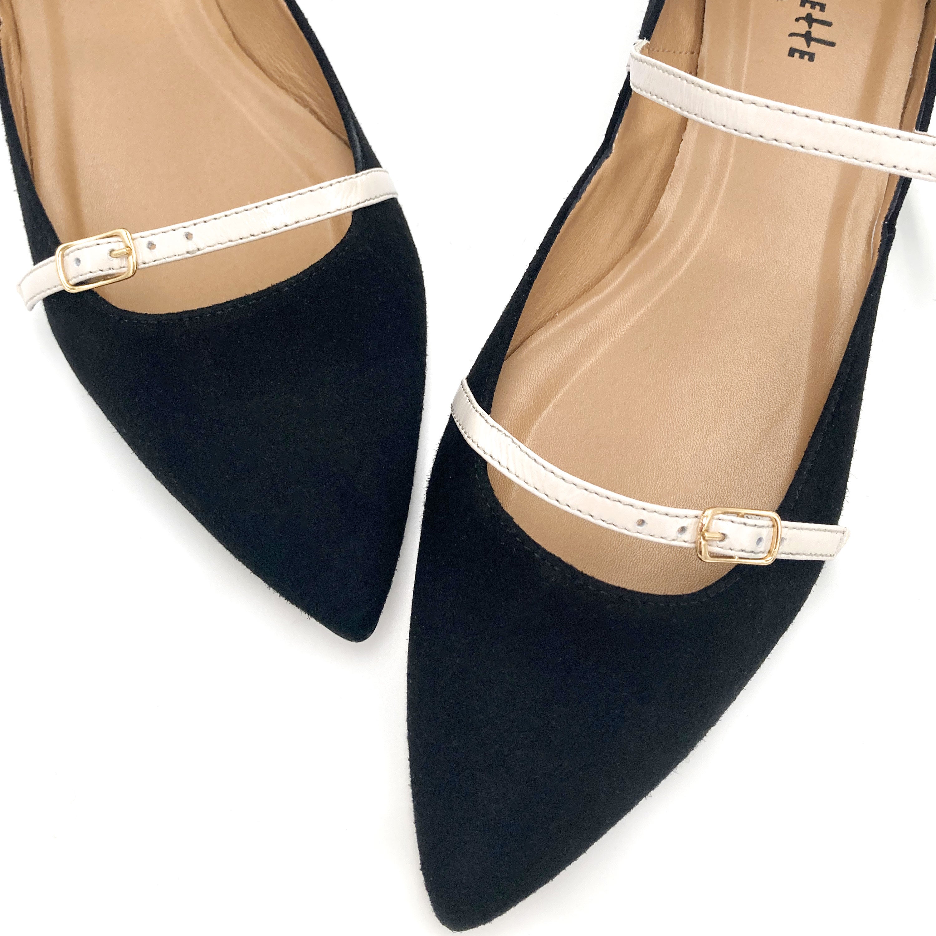 Black suede ballet flats with cream straps