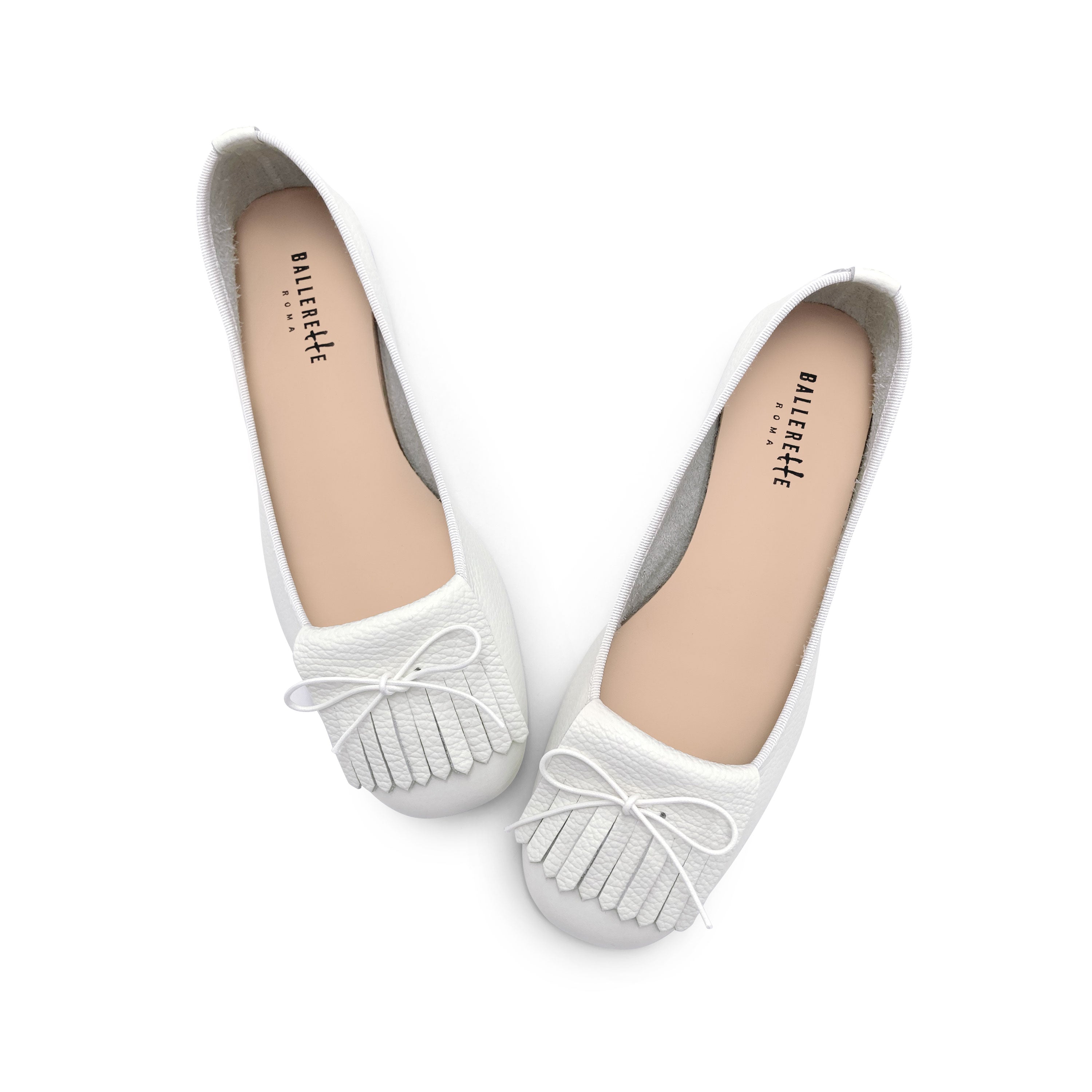 White leather moccasins with fringe