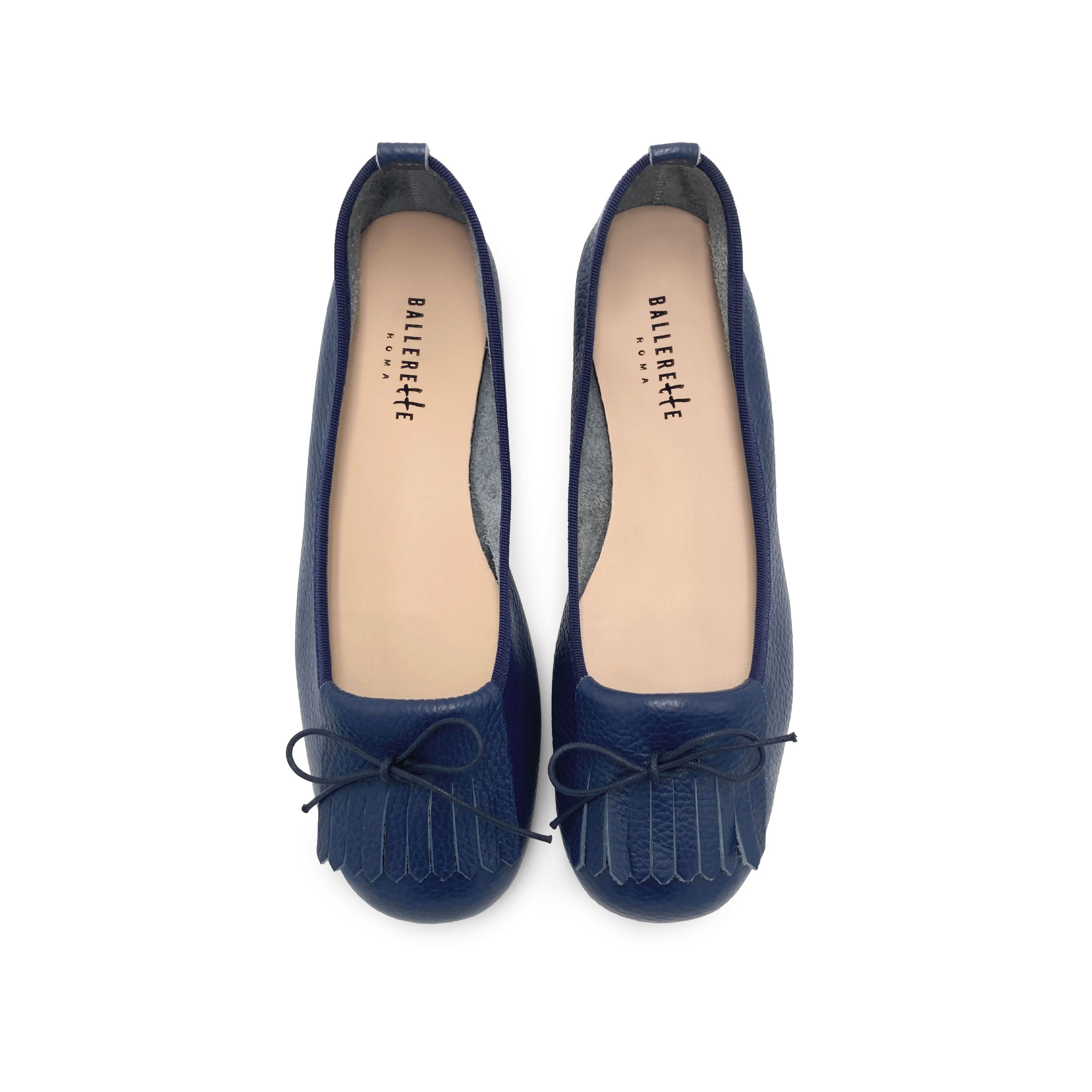 Blue leather moccasins with fringe