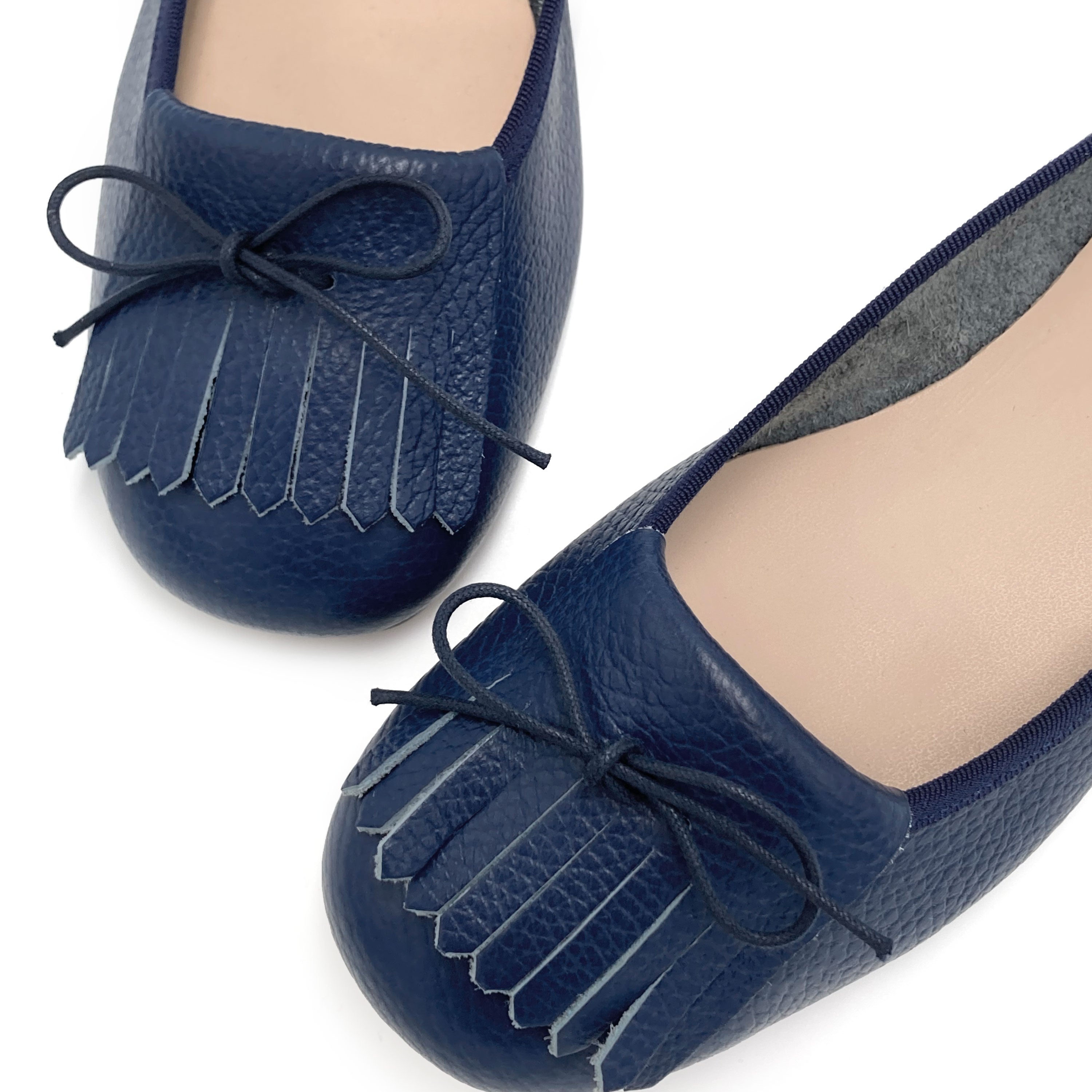 Blue leather moccasins with fringe