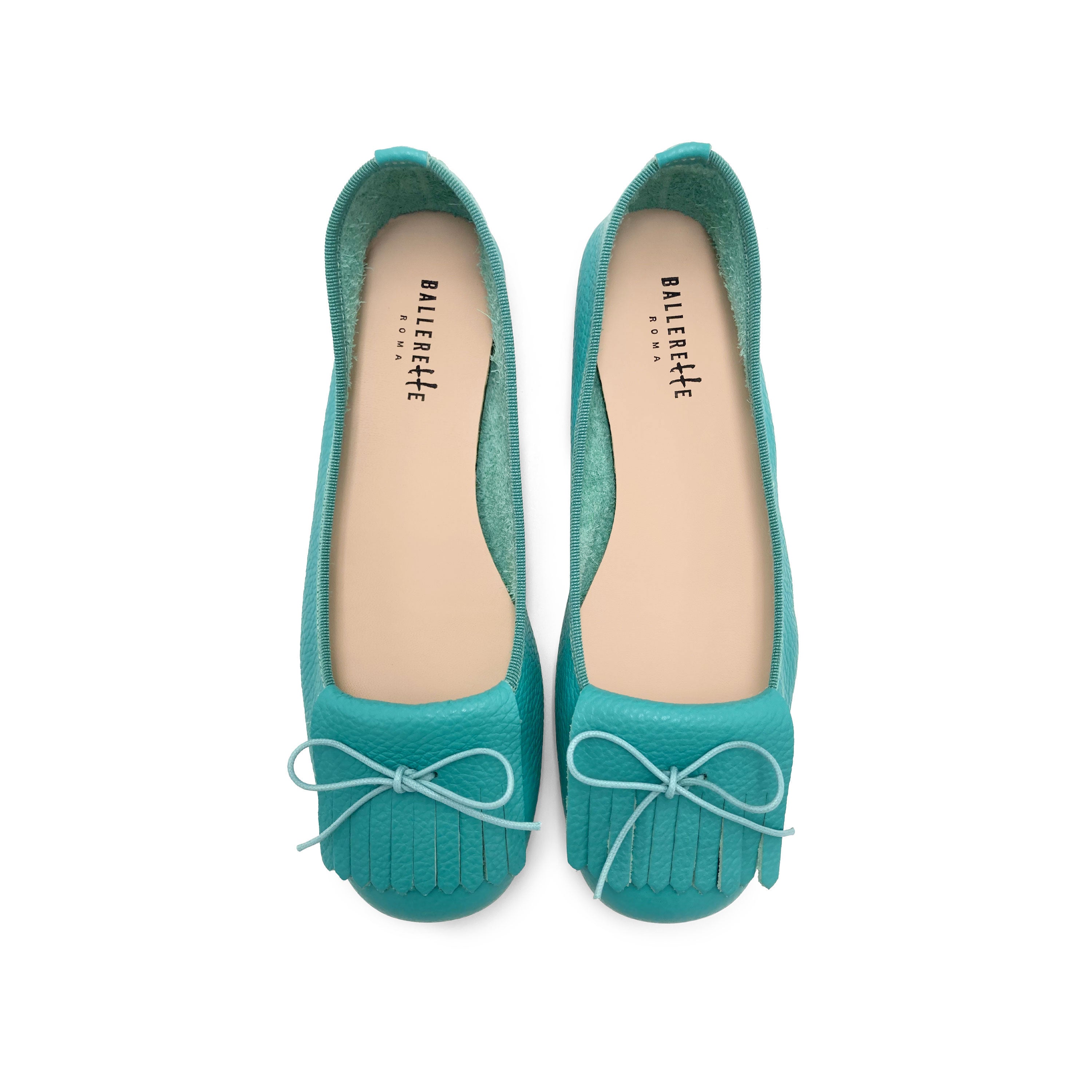Women's aqua blue leather moccasins with fringes