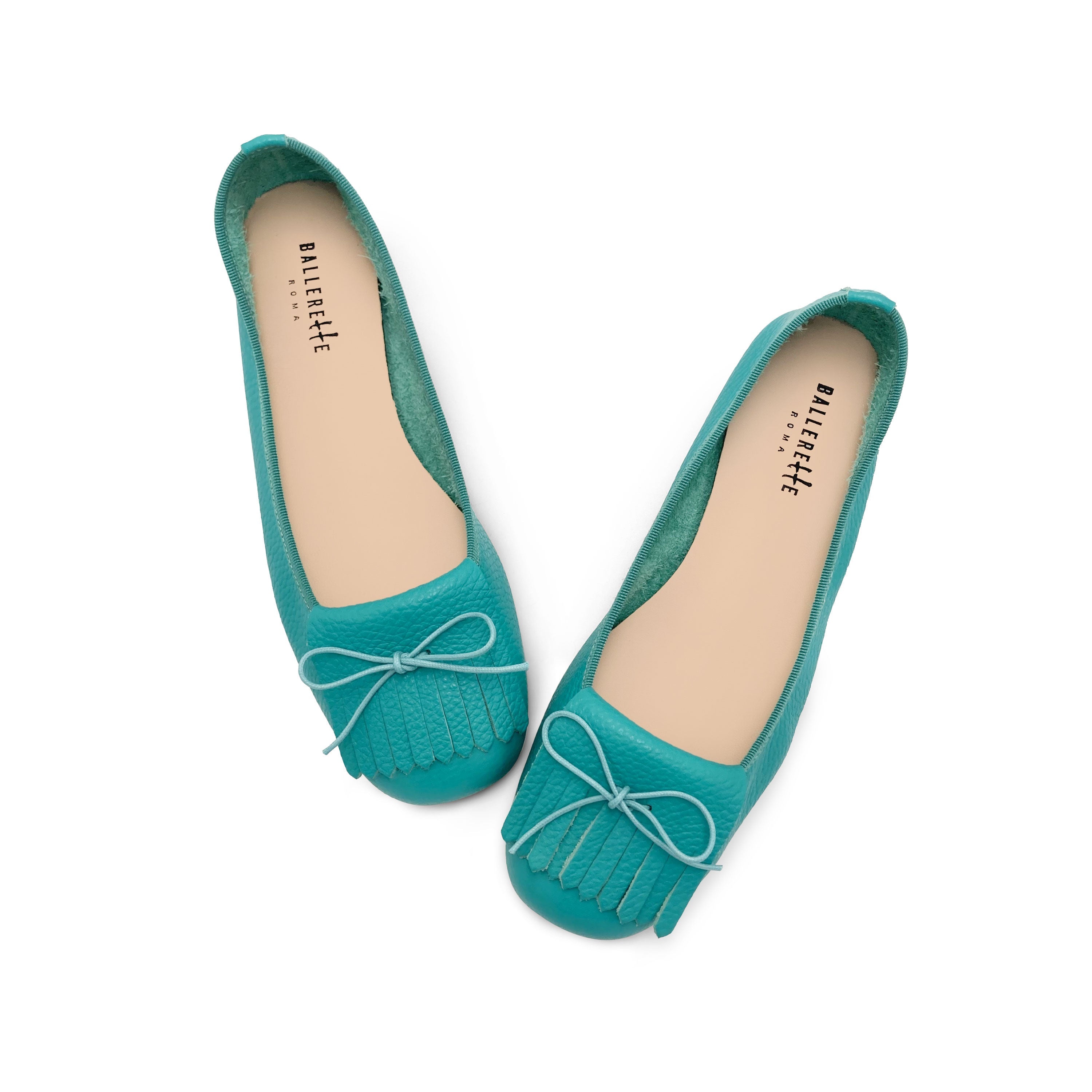 Women's aqua blue leather moccasins with fringes