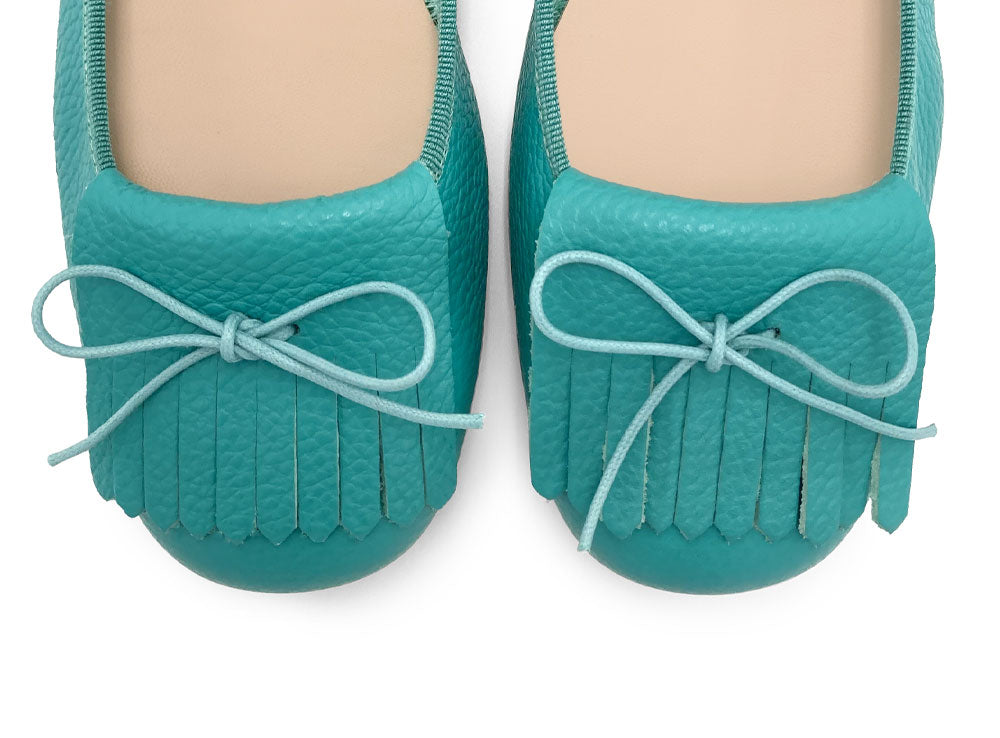 Women's aqua blue leather moccasins with fringes