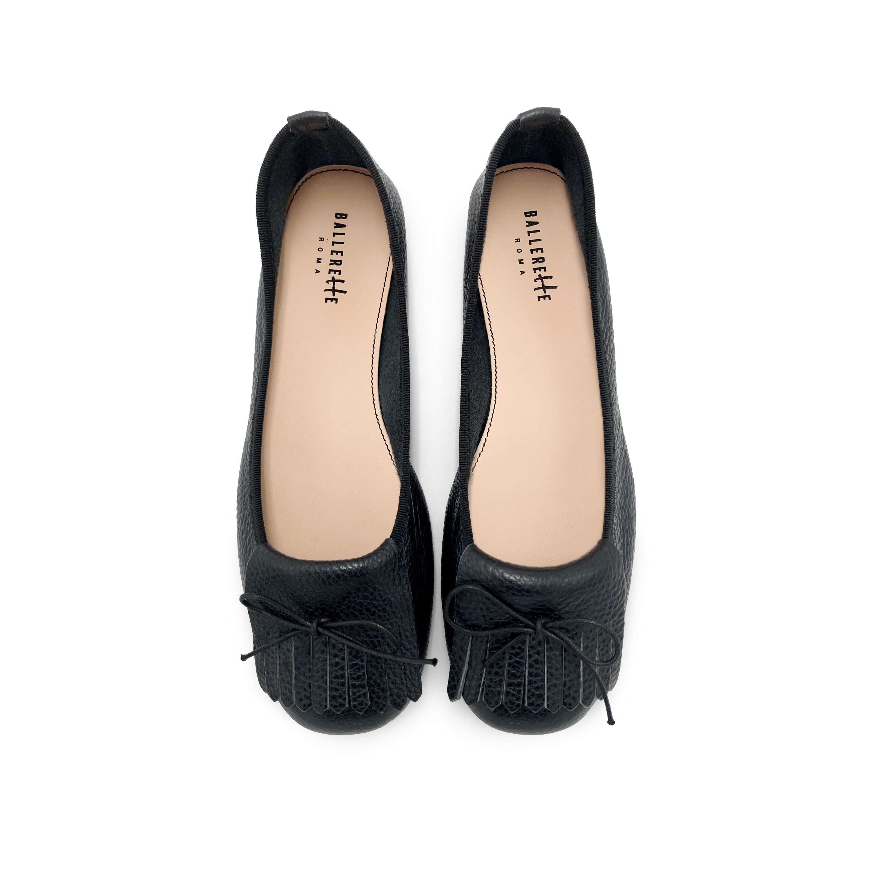 Black leather moccasins with fringe tassel