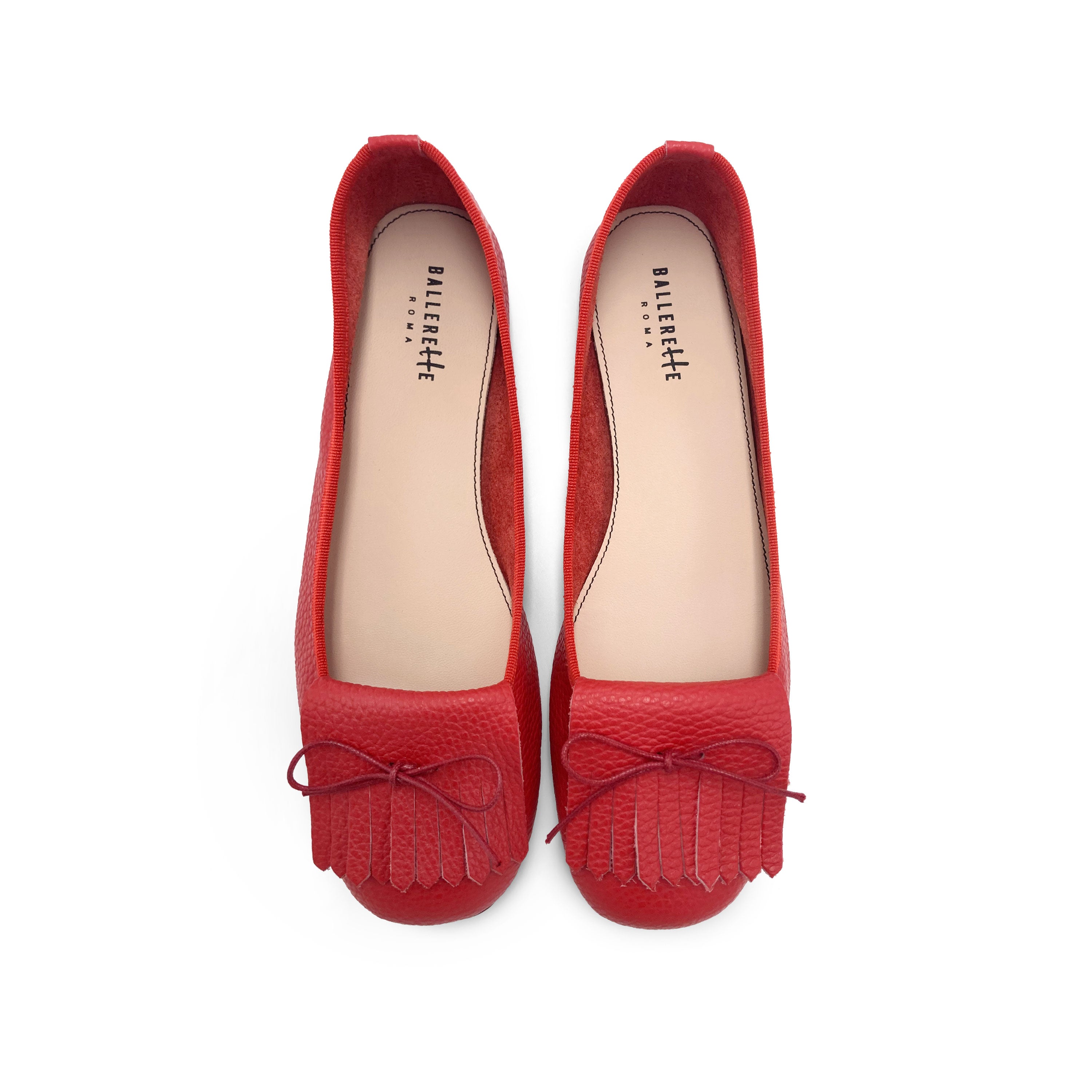 Women's strawberry red leather moccasins with fringes