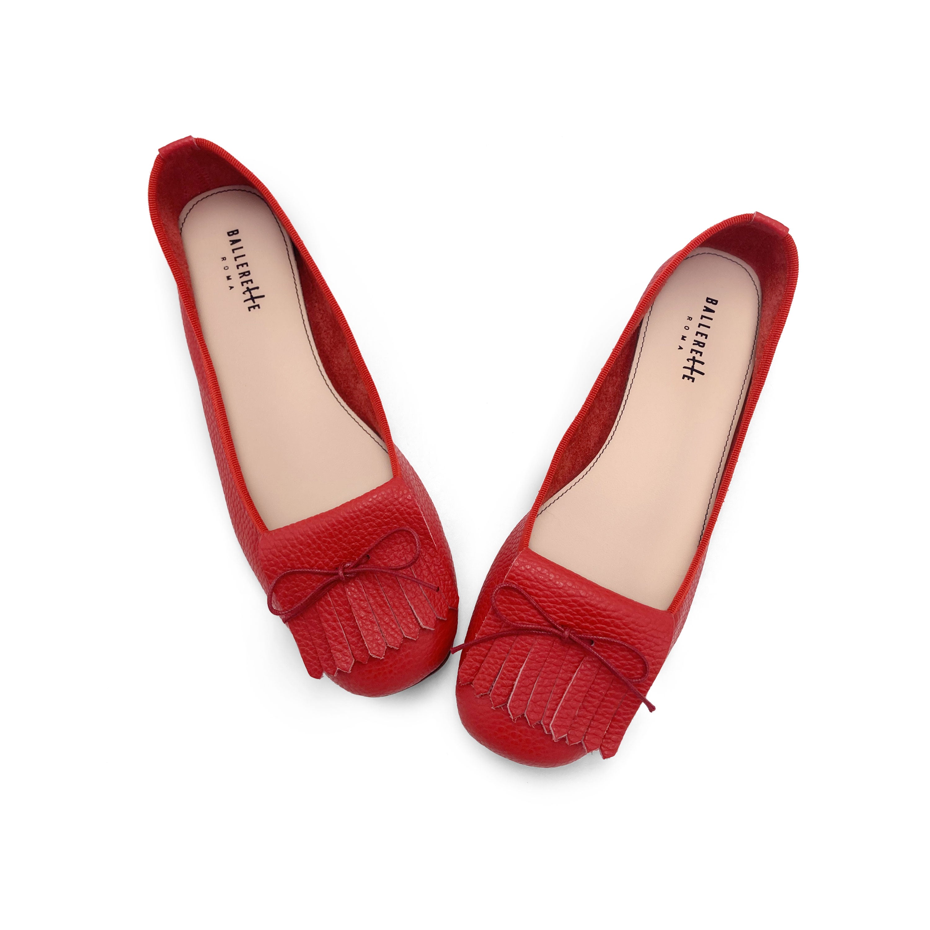Women's strawberry red leather moccasins with fringes