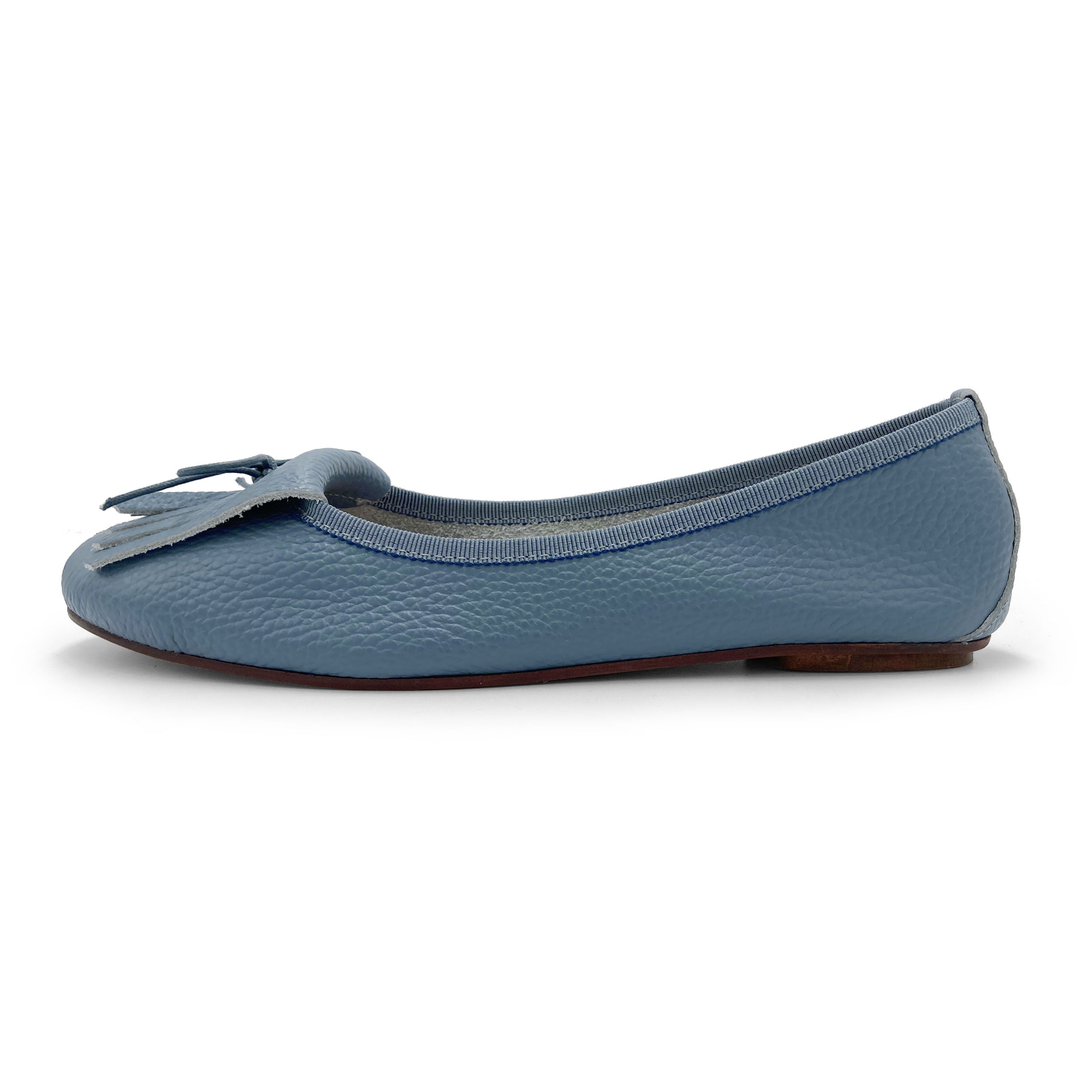 Denim-blue leather moccassins with fringes