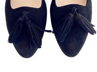 Navy blue suede moccasins with tassels