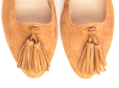 Tan suede moccasins with tassels