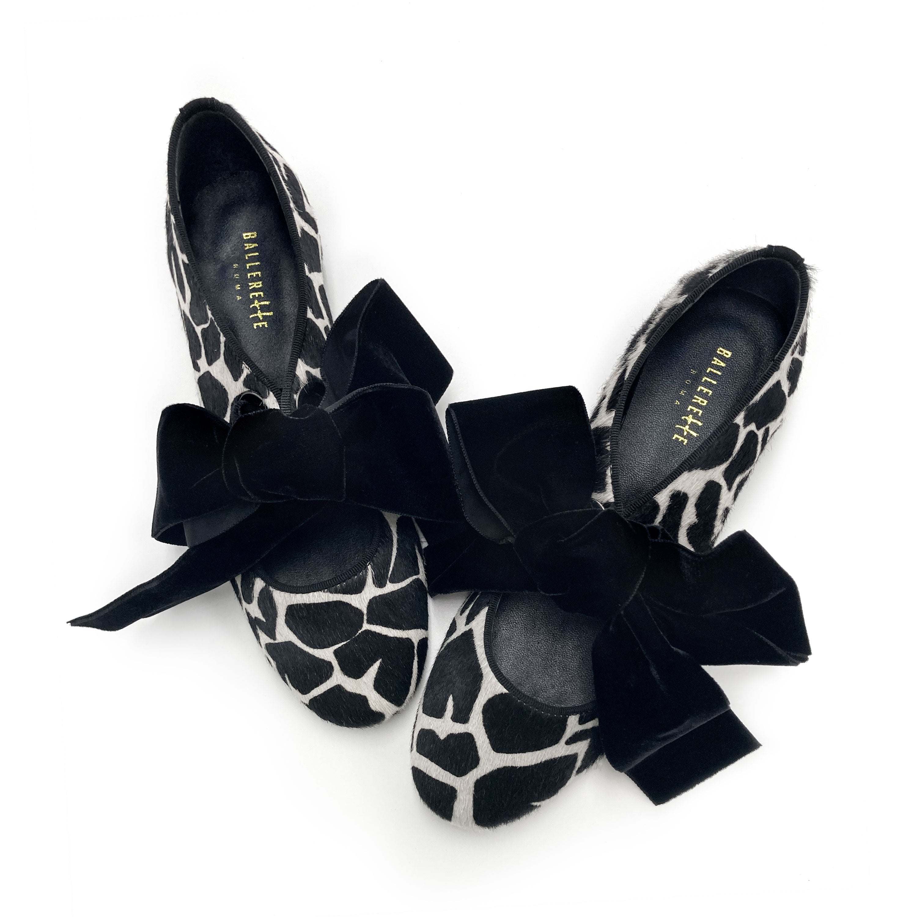 Women's black and white animal print moccasins
