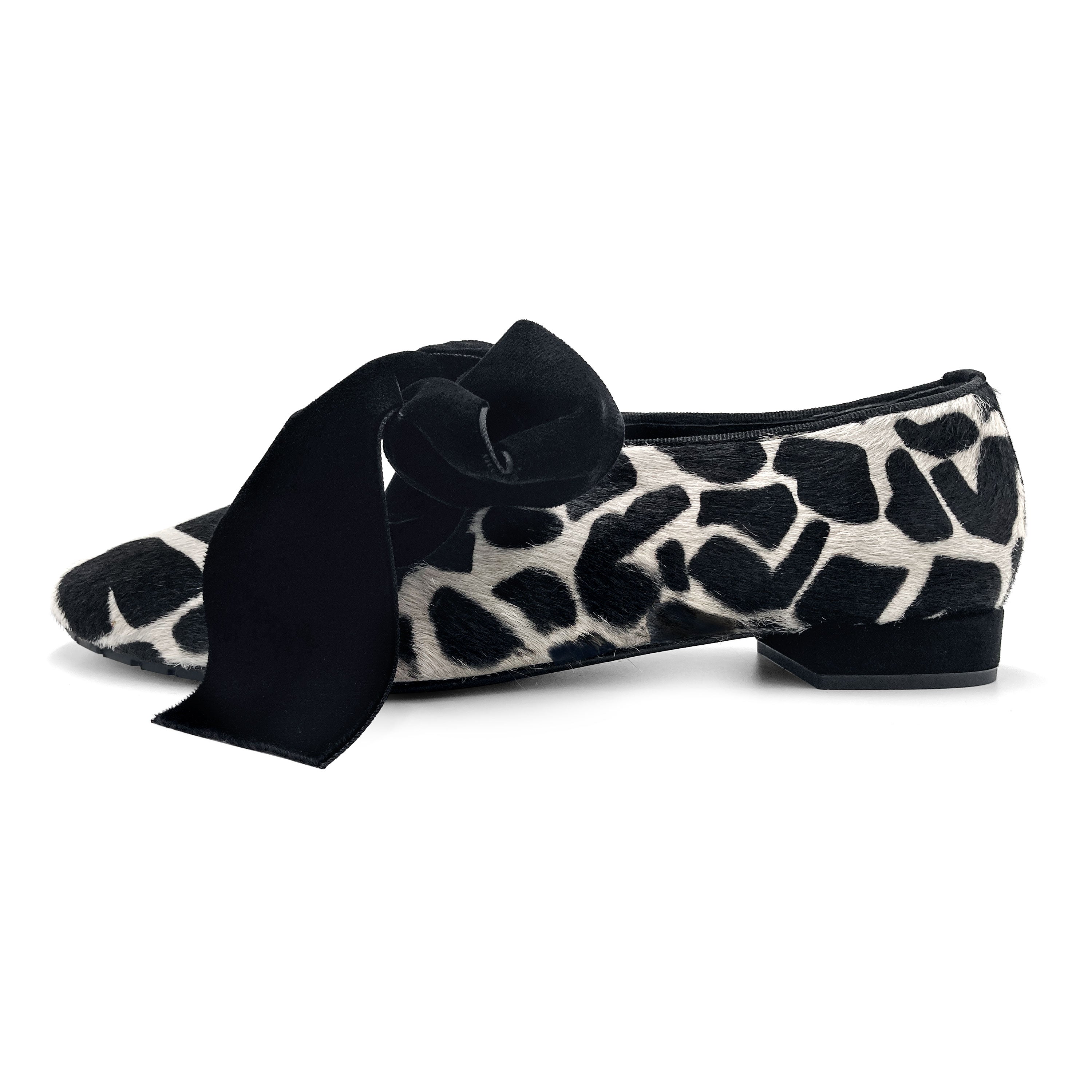 Women's black and white animal print moccasins