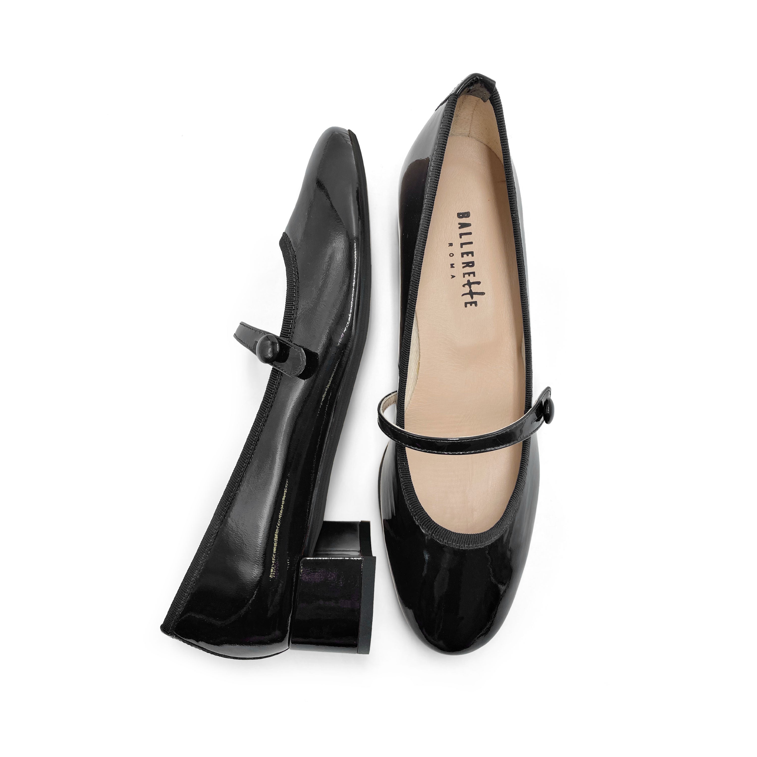 Black patent leather Mary Jane ballet flats with strap and heel