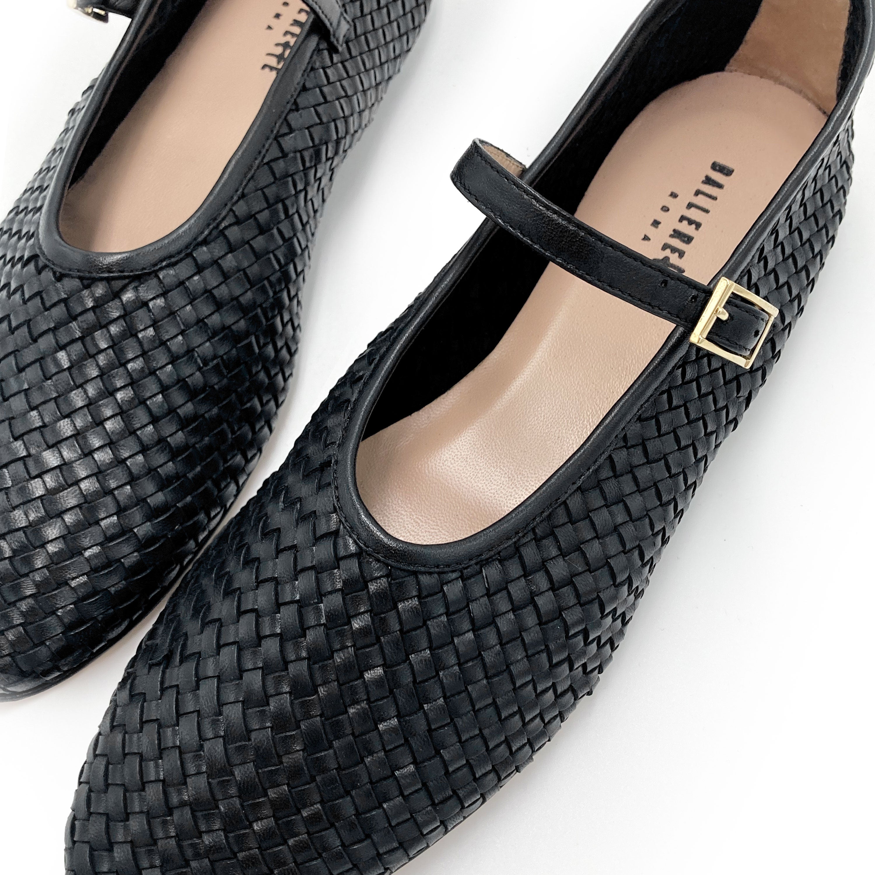 Black high cut handwoven leather ballet flats with strap