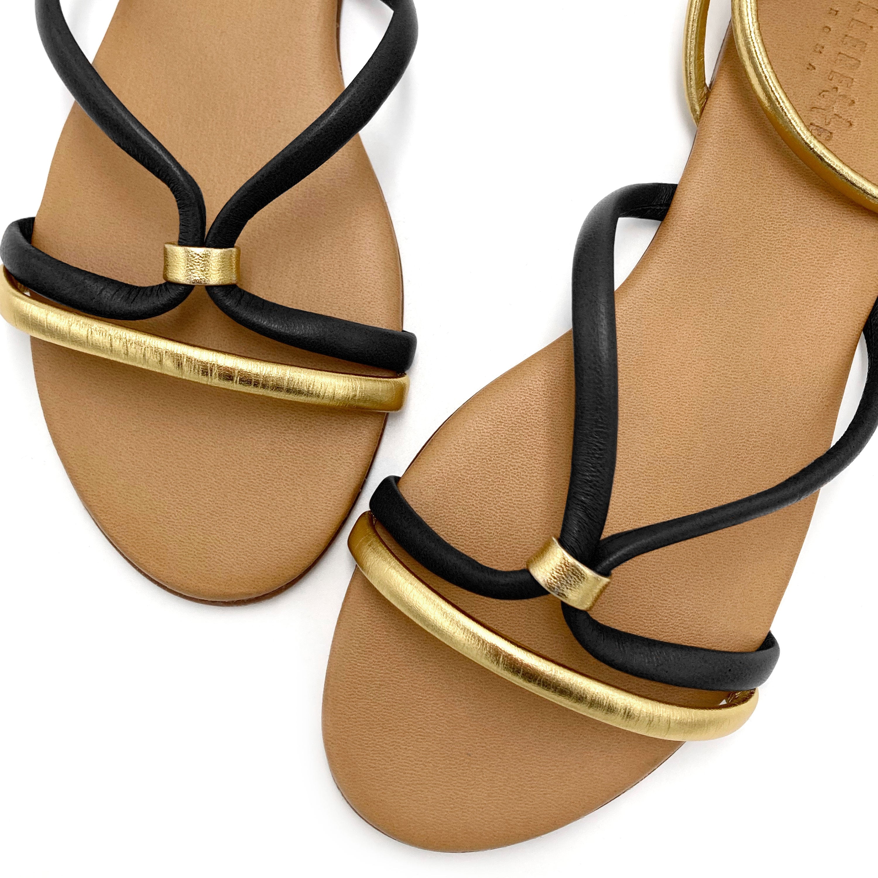 Anckle strap women flat sandals in black and gold leather