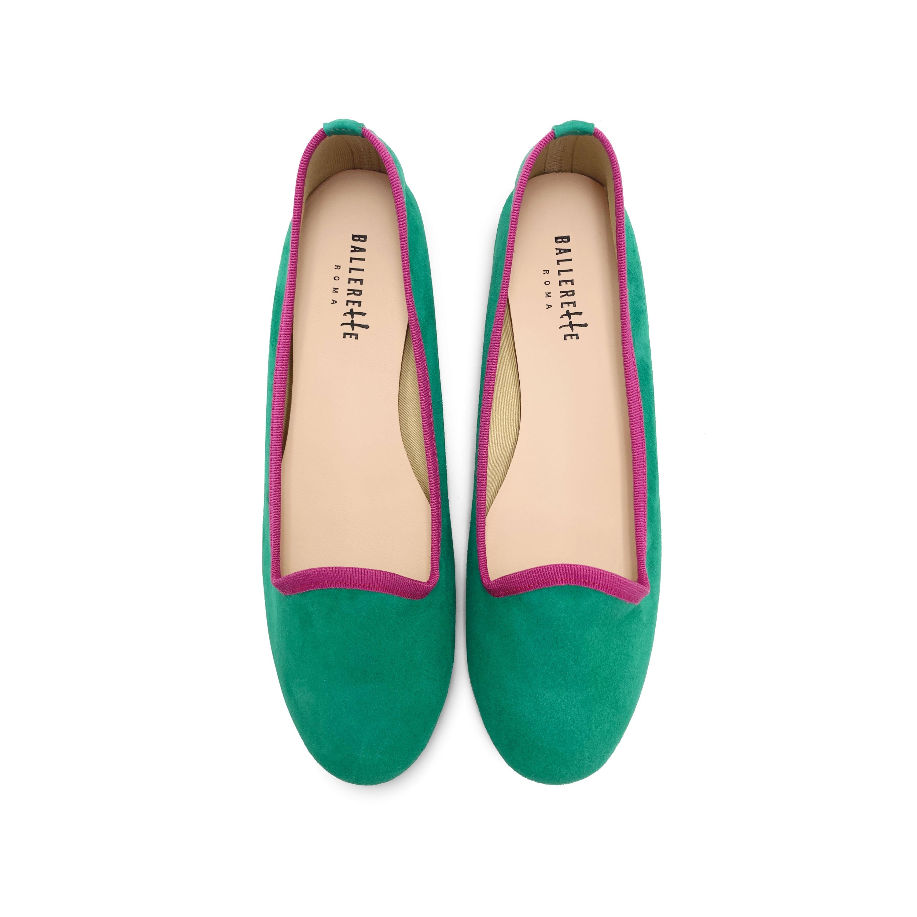 Women's emerald green suede loafers with fuchsia details