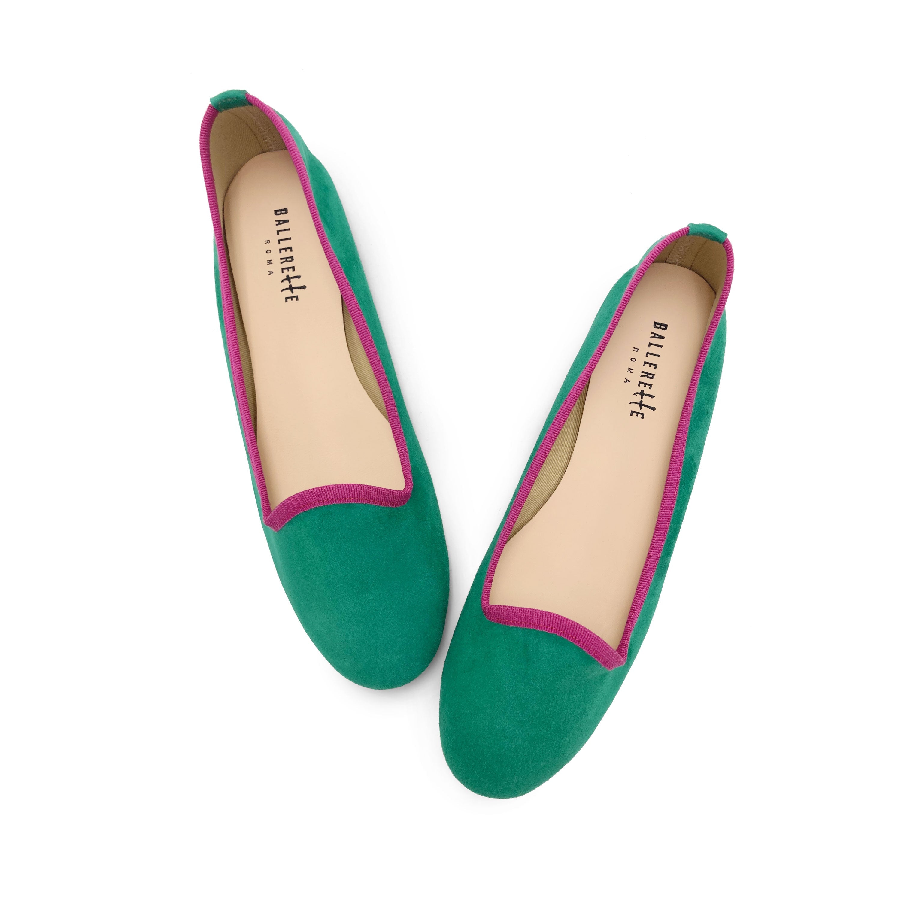 Women's emerald green suede loafers with fuchsia details