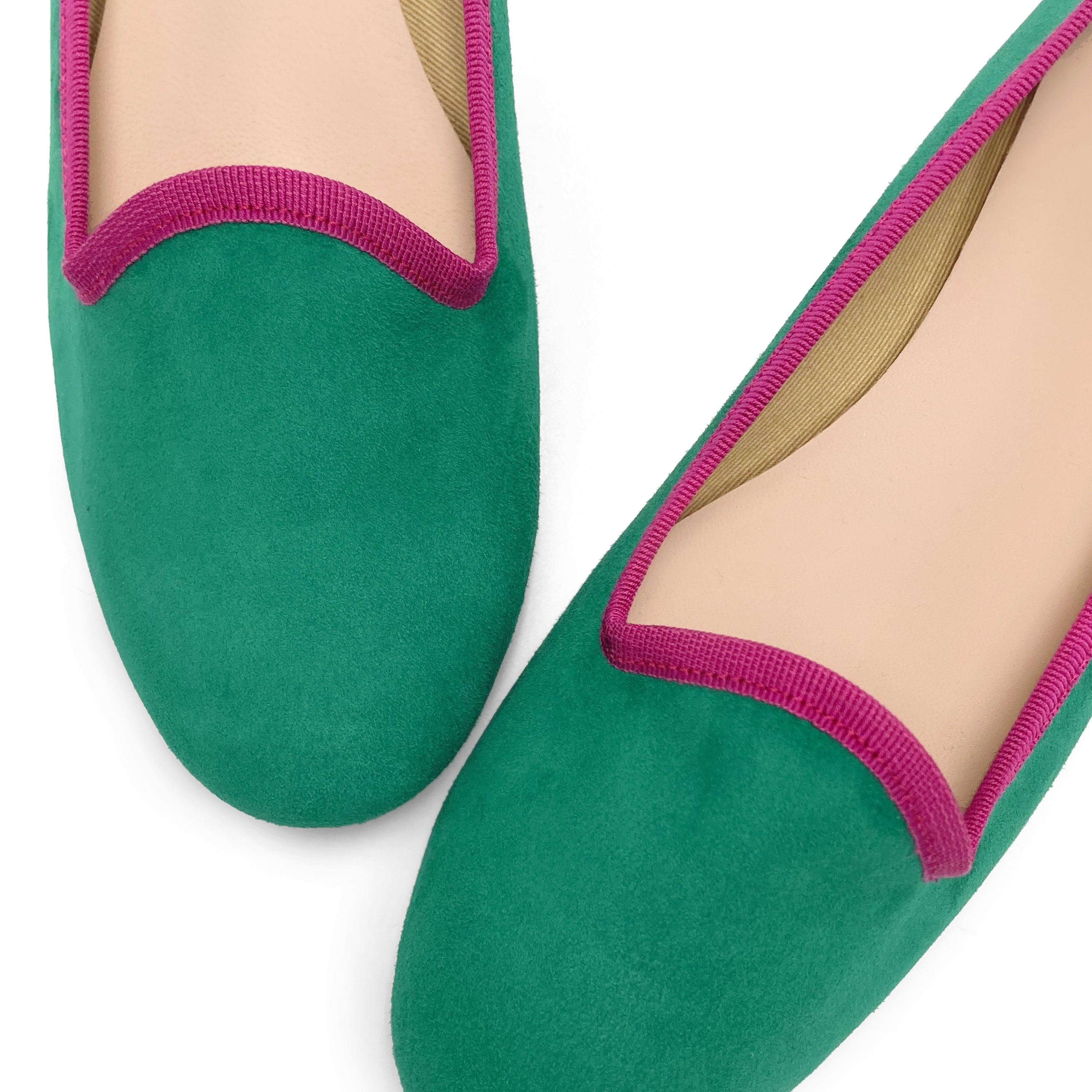 Women's emerald green suede loafers with fuchsia details
