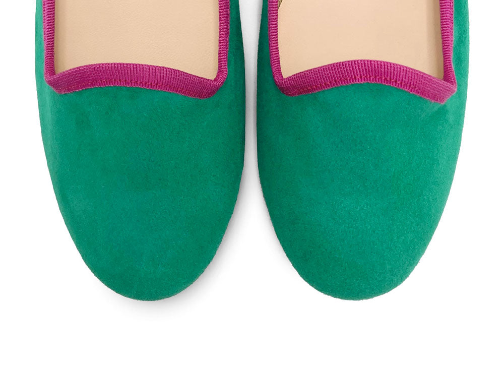 Women's emerald green suede loafers with fuchsia details