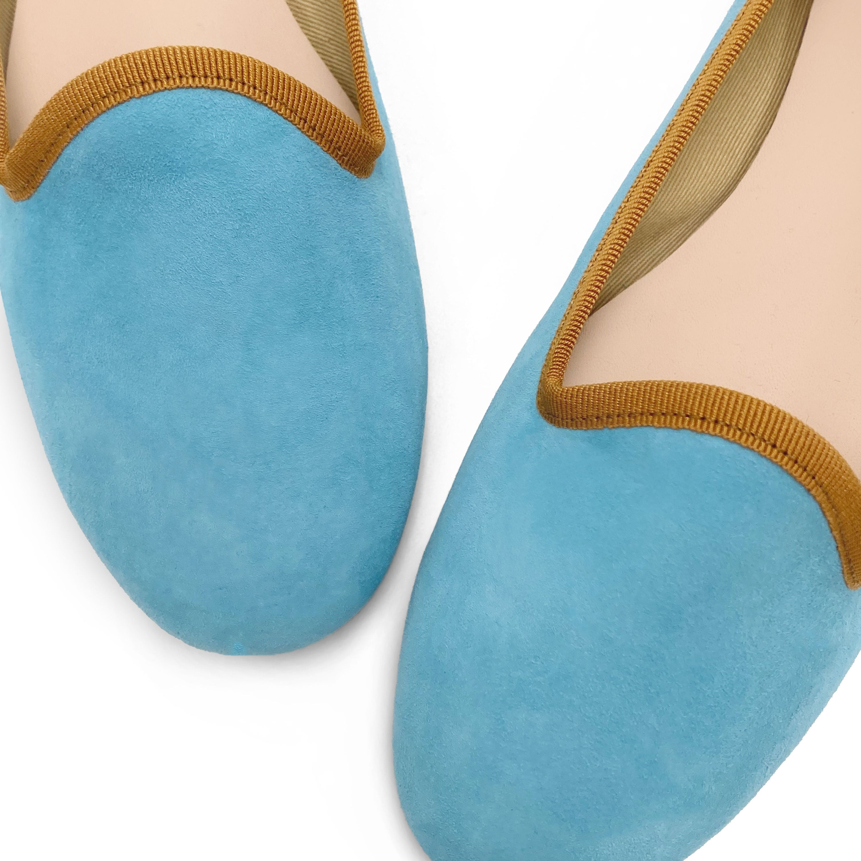 Women's aqua blue suede loafers with ochre details