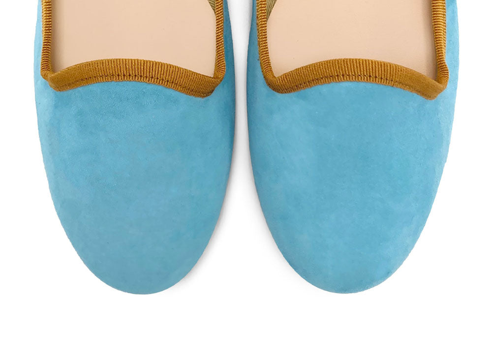 Women's aqua blue suede loafers with ochre details
