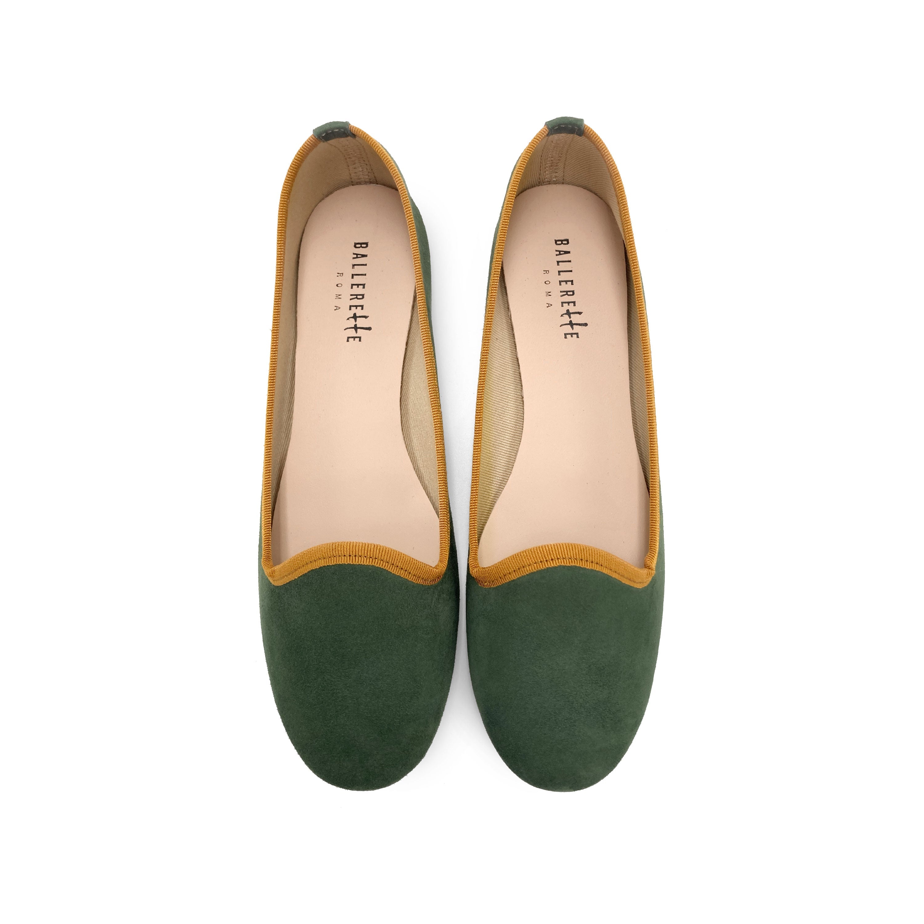 Forest green suede loafers with amber yellow details
