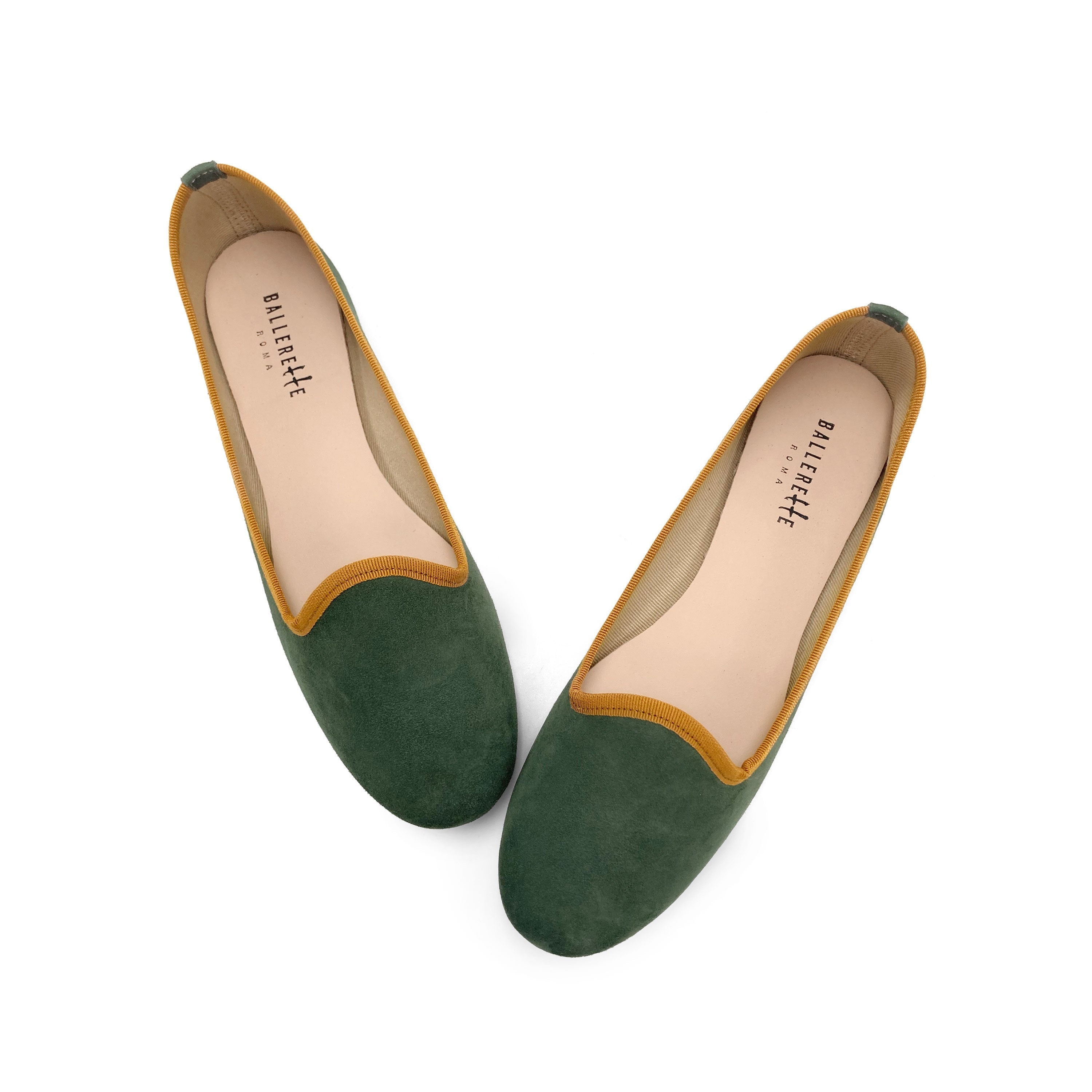 Forest green suede loafers with amber yellow details