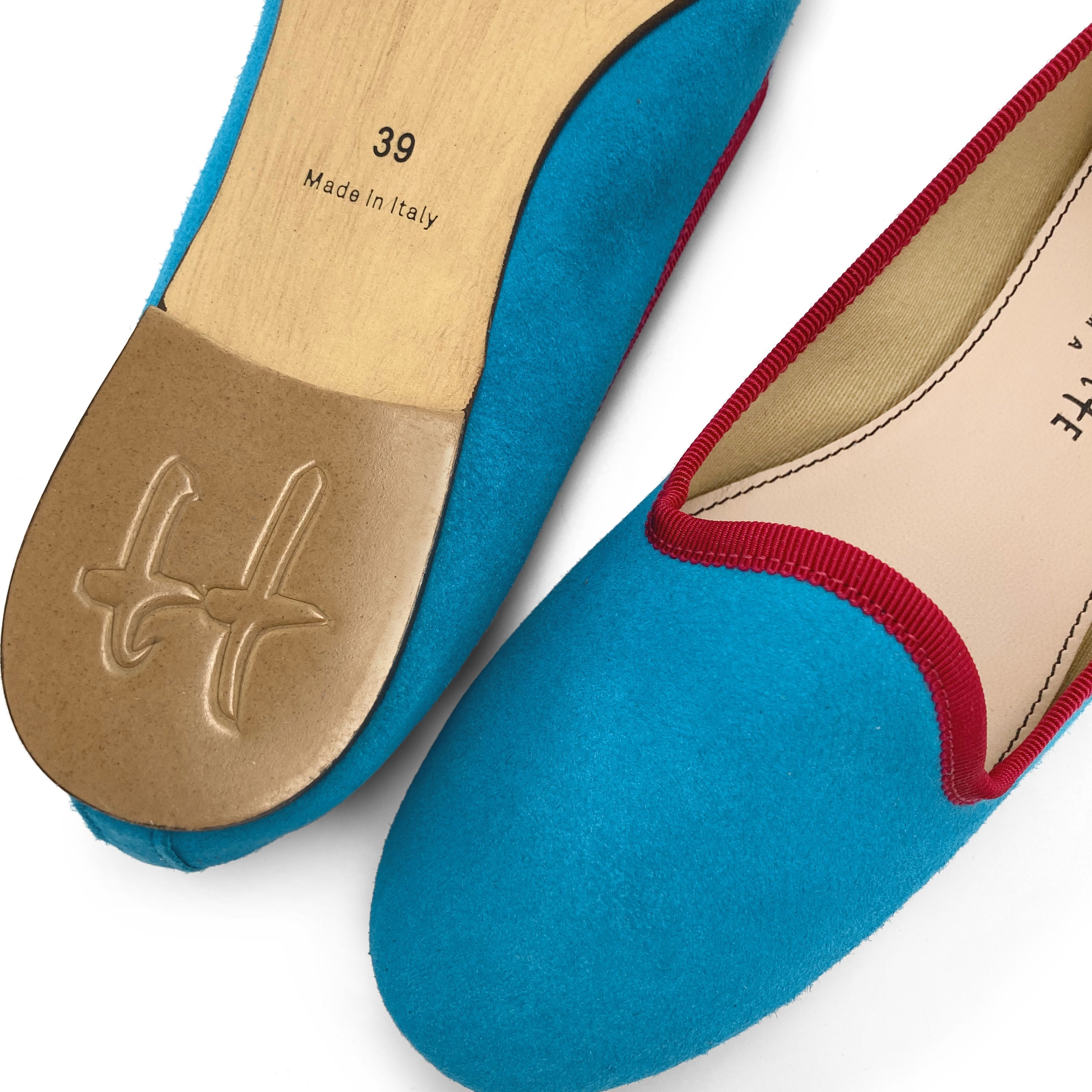 Women’s loafers in turquoise suede with fuchsia details