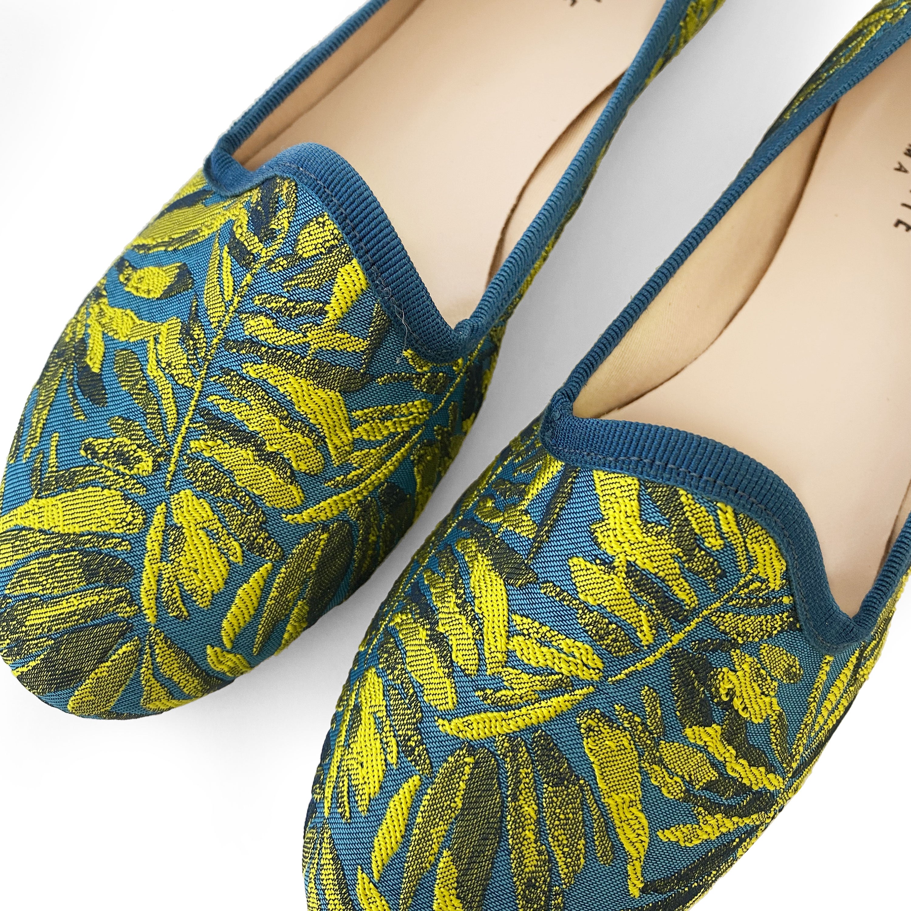 Blue and yellow jacquard loafers with tropical print