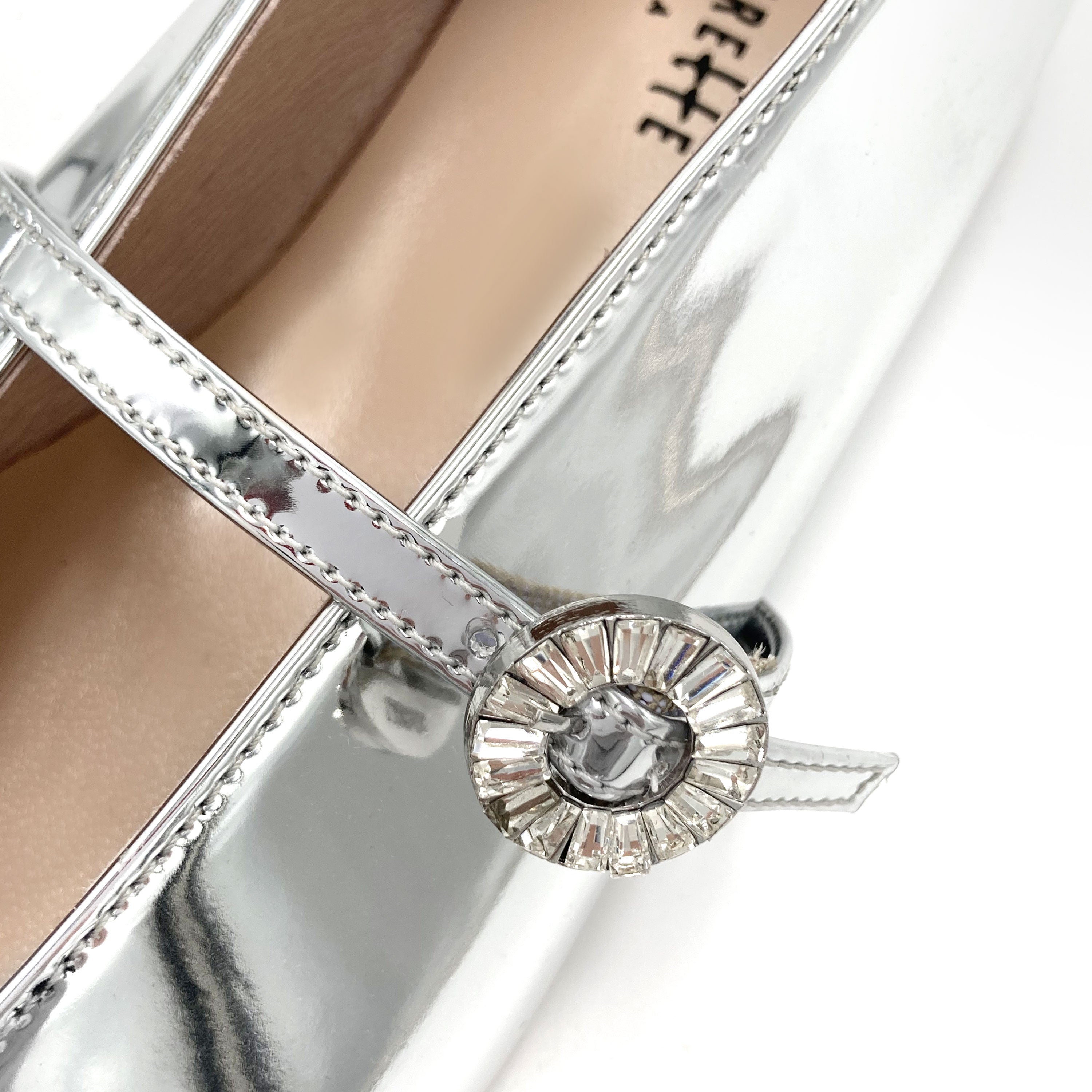Silver mirrored ballet flats with V cut and jeweled strap